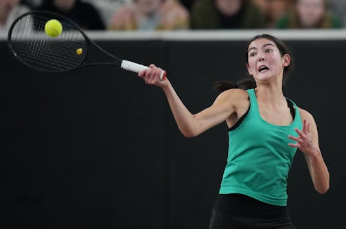 Claire Loftus of Rochester Mayo returns a volley on the way to beating Rashi Singh of Edina at the Baseline Tennis Center in Minneapolis, Minnesota on Wednesday, Oct. 25, 2023. Edina takes on Mayo in the team state championship for girls's tennis.] RICHARD TSONG-TAATARII • richard.tsong-taatarii @startribune.com