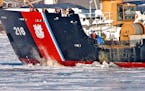 Ice yields before the re-enforced bow of the USCGC Alder on Tuesday, March 11, 2008. 