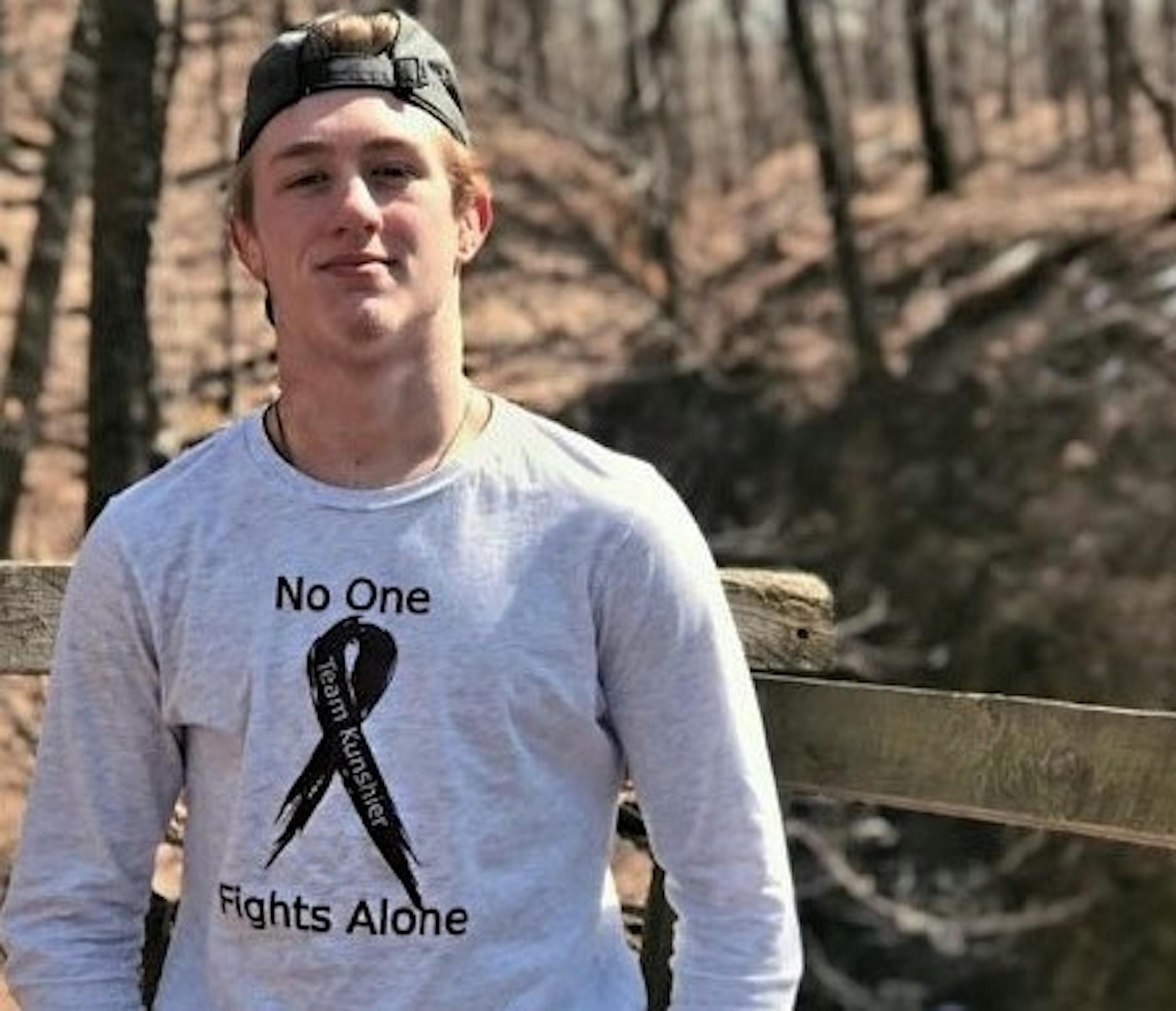 Forest Lake senior wrestler Derrick Cardinal wore a t-shirt this season honoring his coach's wife, who was stricken with cancer before the season. (submitted photo)