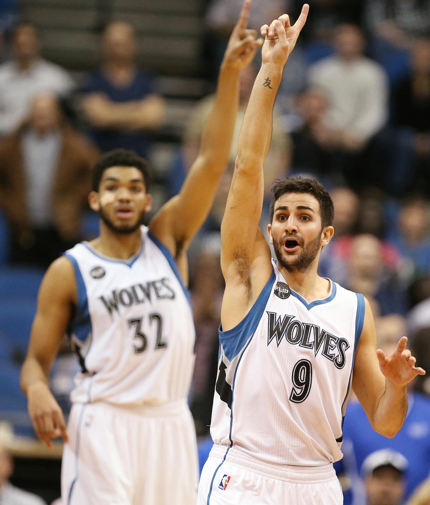 Minnesota Timberwolves guard Ricky Rubio (9) and Minnesota Timberwolves center Karl-Anthony Towns (32), left, dispute a call during the second half. ] (Leila Navidi/Star Tribune) leila.navidi@startribune.com BACKGROUND INFORMATION: The Minnesota Timberwolves play the Los Angeles Clippers at Target Center in Minneapolis on Monday, December 7, 2015. Los Angeles won the game 110-106. ORG XMIT: MIN1512072218180839