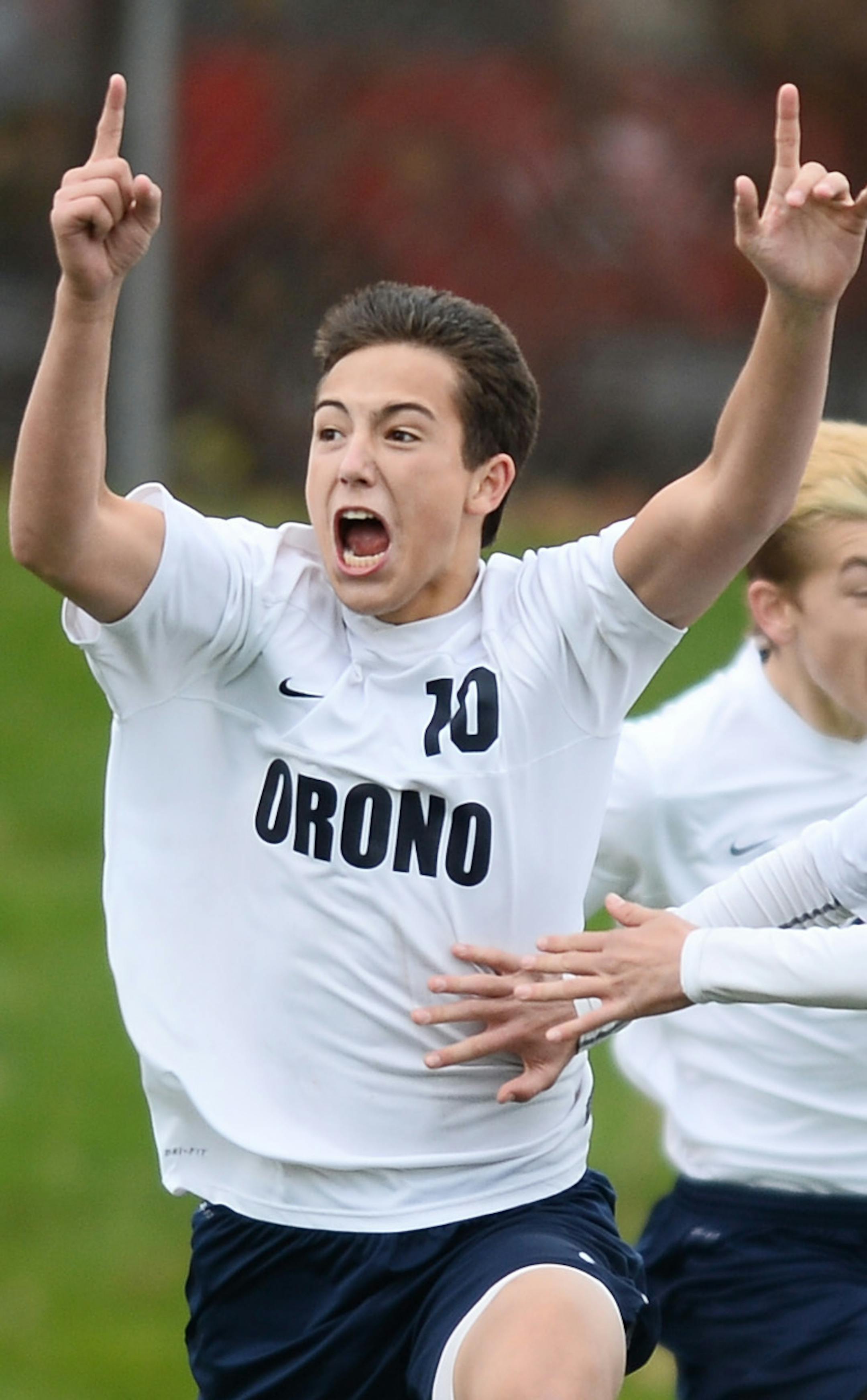 Orono forward Alex Kill (10) celebrated with teammates after scoring the game-winning goal in overtime against Breck Thursday. ] (AARON LAVINSKY/STAR TRIBUNE) aaron.lavinsky@startribune.com Orono played Breck in the boys' 1A soccer state championship game on Thursday, Nov. 5, 2015 at Husky Stadium at St. Cloud State University. Orono won 2-1 in overtime.