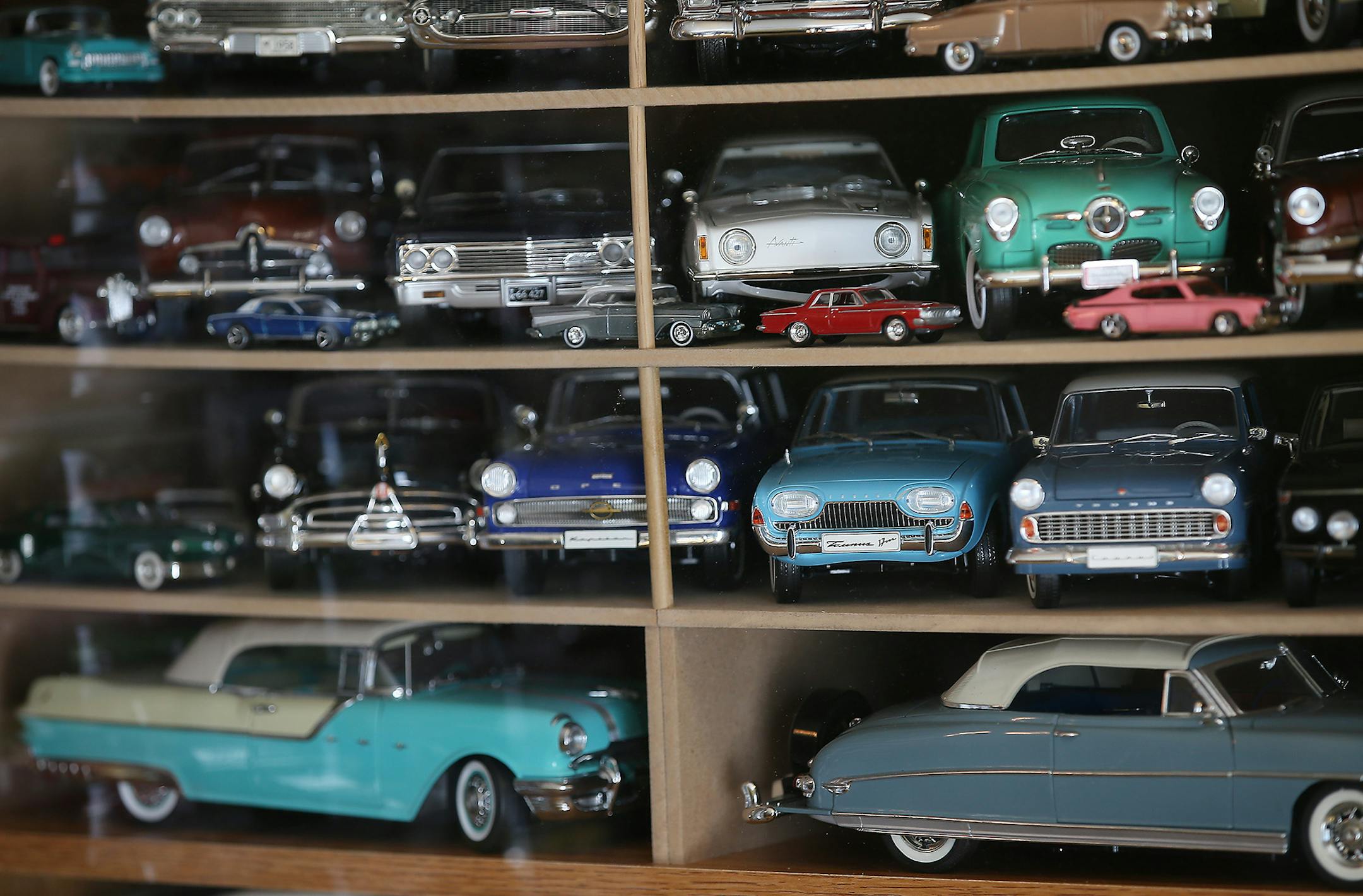 Dennis Erickson had model cars covering almost every inch of his Eagan house, which he also left to the church.
