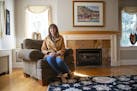 Susan Dusek, a real estate agent for Edina Realty, in the living room of a Tudor house for sale in the Congdon Park neighborhood of Duluth. More buyer