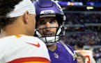 Patrick Mahomes, left, and Kirk Cousins had a quarterback chat after the Chiefs-Vikings game in October.
