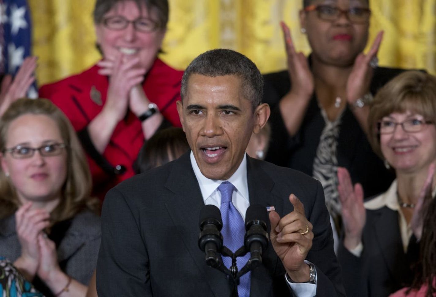 President Barack Obama speaks in the East Room of the White House in Washington, Tuesday, April 8, 2014, during an event marking Equal Pay Day.