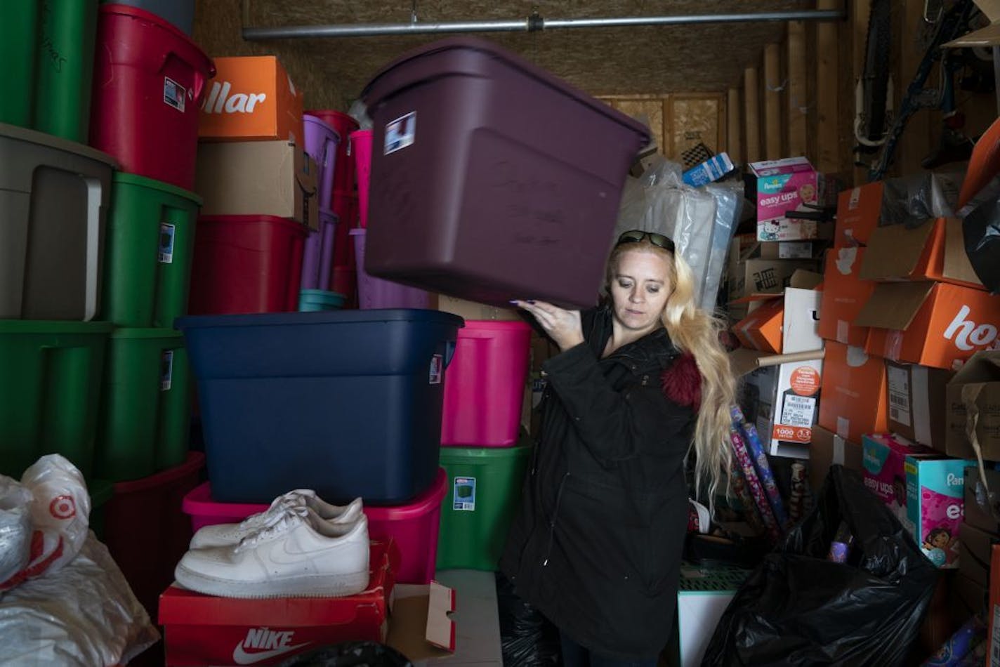 Anita Ewald dropped off some containers to her storage unit in Coon Rapids, Minn., on Friday, March 1, 2019. Ewald keeps her holiday decorations, presents and her six kids' school stuff and old clothes at her storage unit.