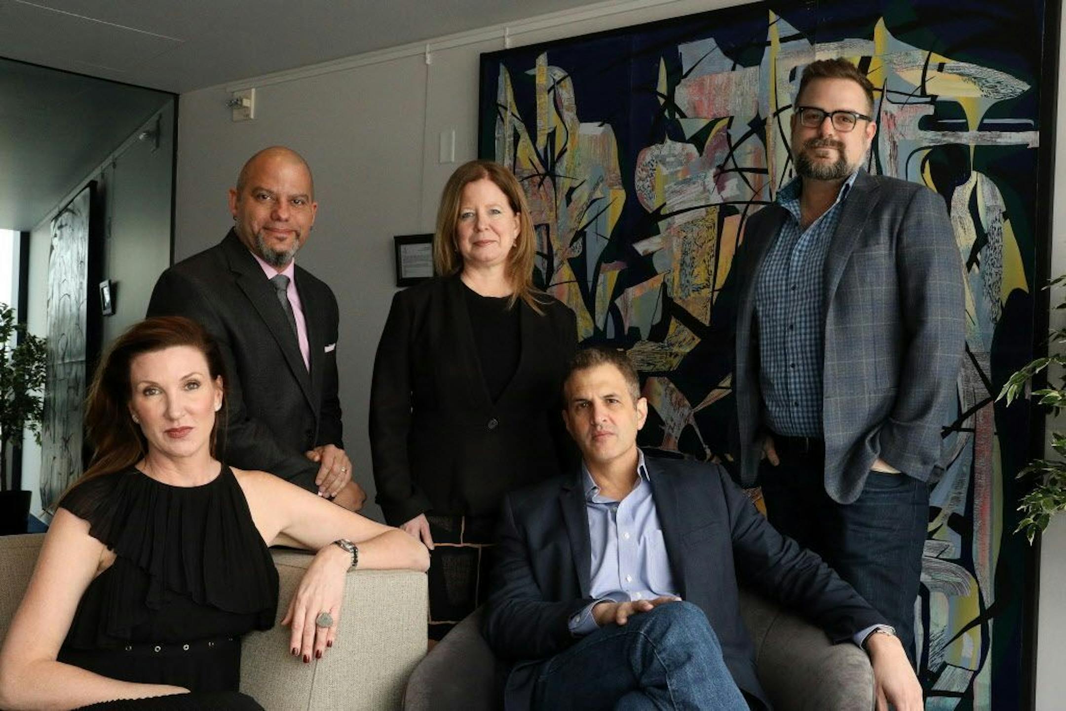The Guthrie's senior leadership team, from left, development director Danielle St.Germain-Gordon, production director David Stewart, managing director Jennifer Bielstein, artistic director Joe Haj, and associate artistic director Jeff Meanza sat for a portrait Thursday.