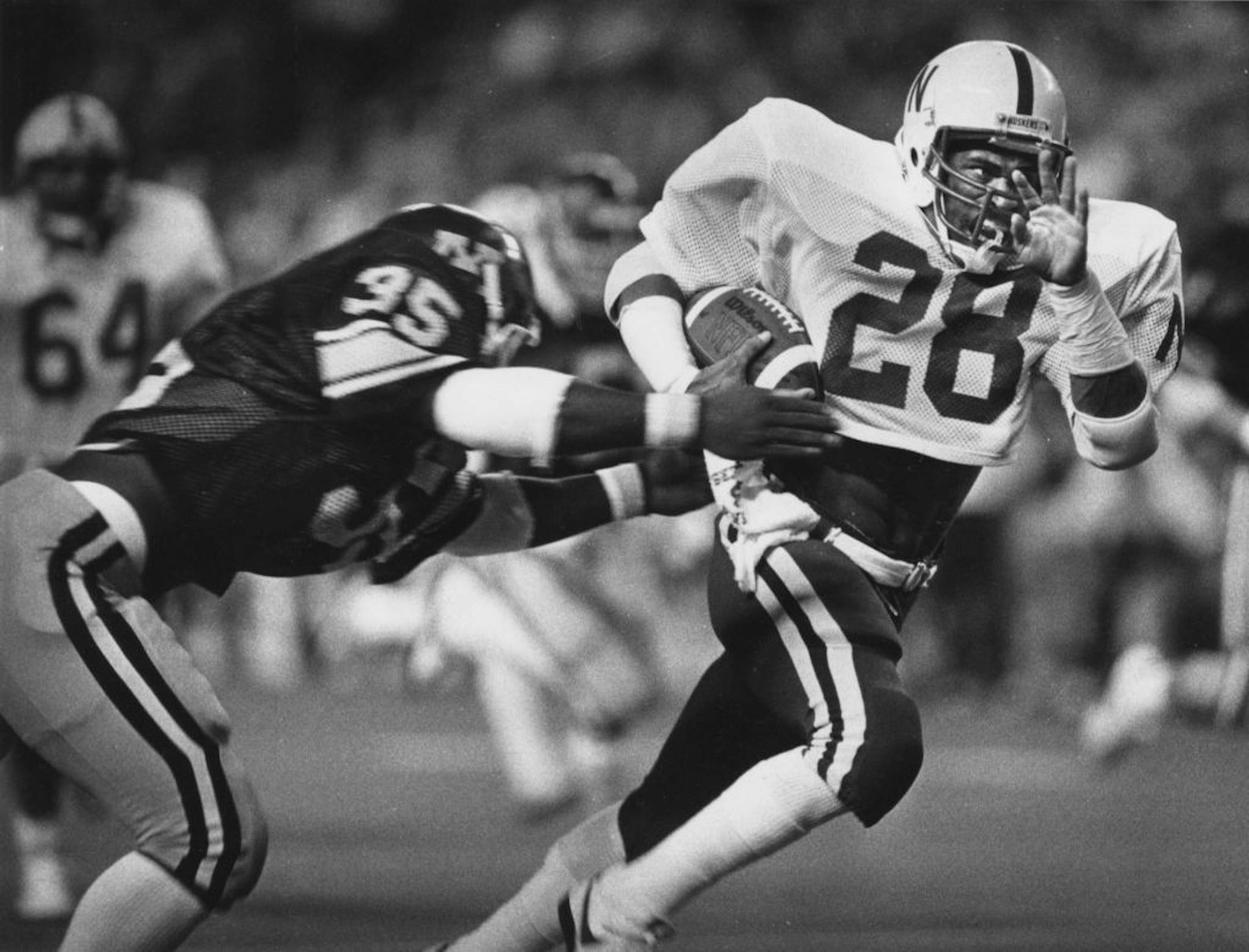 Jeff Smith was off to the races in Nebraska's 84-13 victory over the Gophers in 1983.