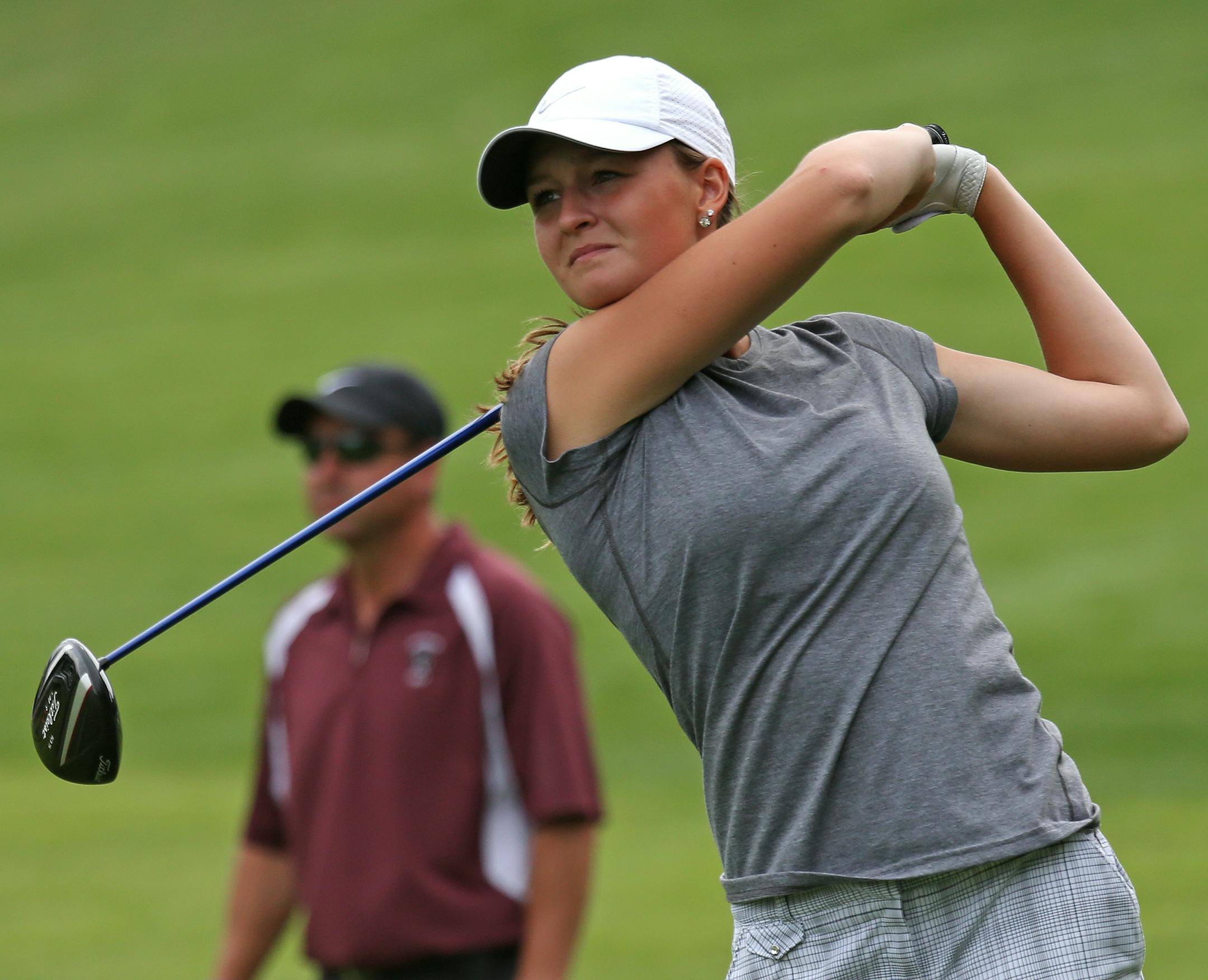 New Pragues's Kenzie Neisen hit the ball from the 4th hole tee on the west course, during the second day of the Girls Class AAA Golf Tournament, Bunker Hills Golf Course, Coon Rapids MN.] Bruce Bisping/Star Tribune bbisping@startribune.com Kenzie Neisen/roster.