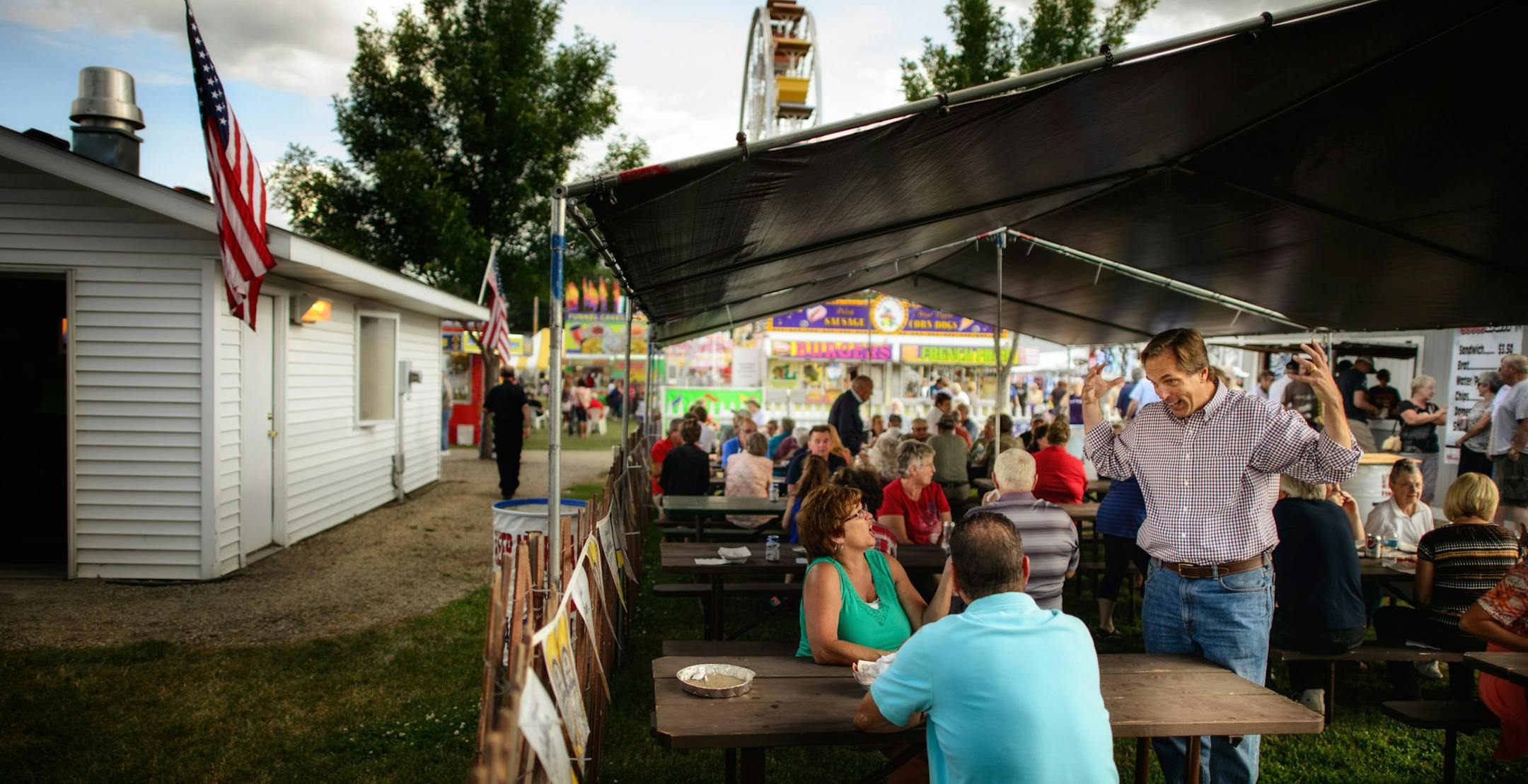 GOP Senate candidate Mike McFadden talked with potential voters in the American Legion area of the Waseca County Free Fair, Wednesday, July 16, 2014. ] GLEN STUBBE * gstubbe@startribune.com