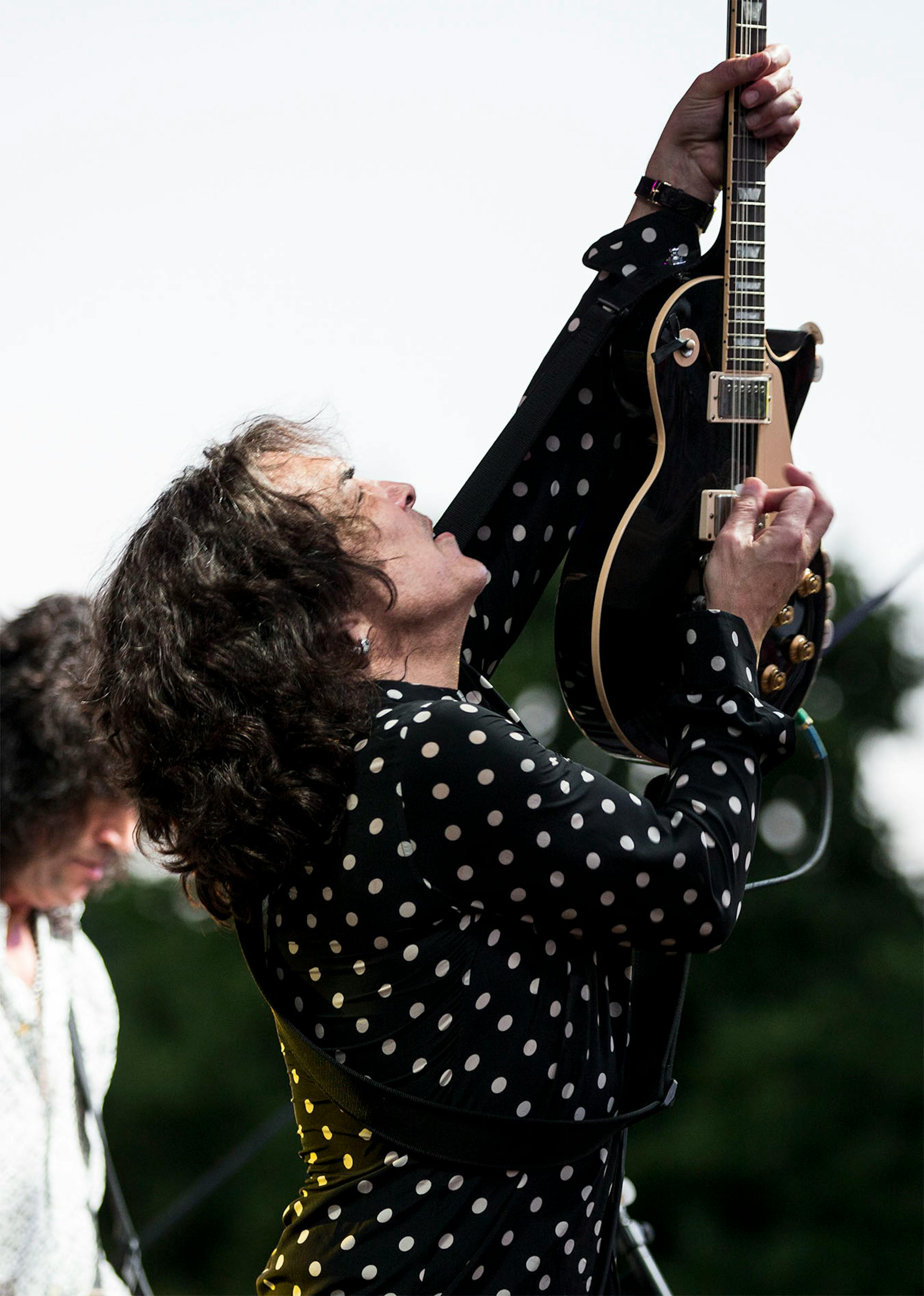 Paul Stanley of Kiss performed with the band on stage during a charity concert at philanthropist Martha "Muffy" MacMillan's home on Tuesday, August 2, 2016, in Long Lake, Minn.