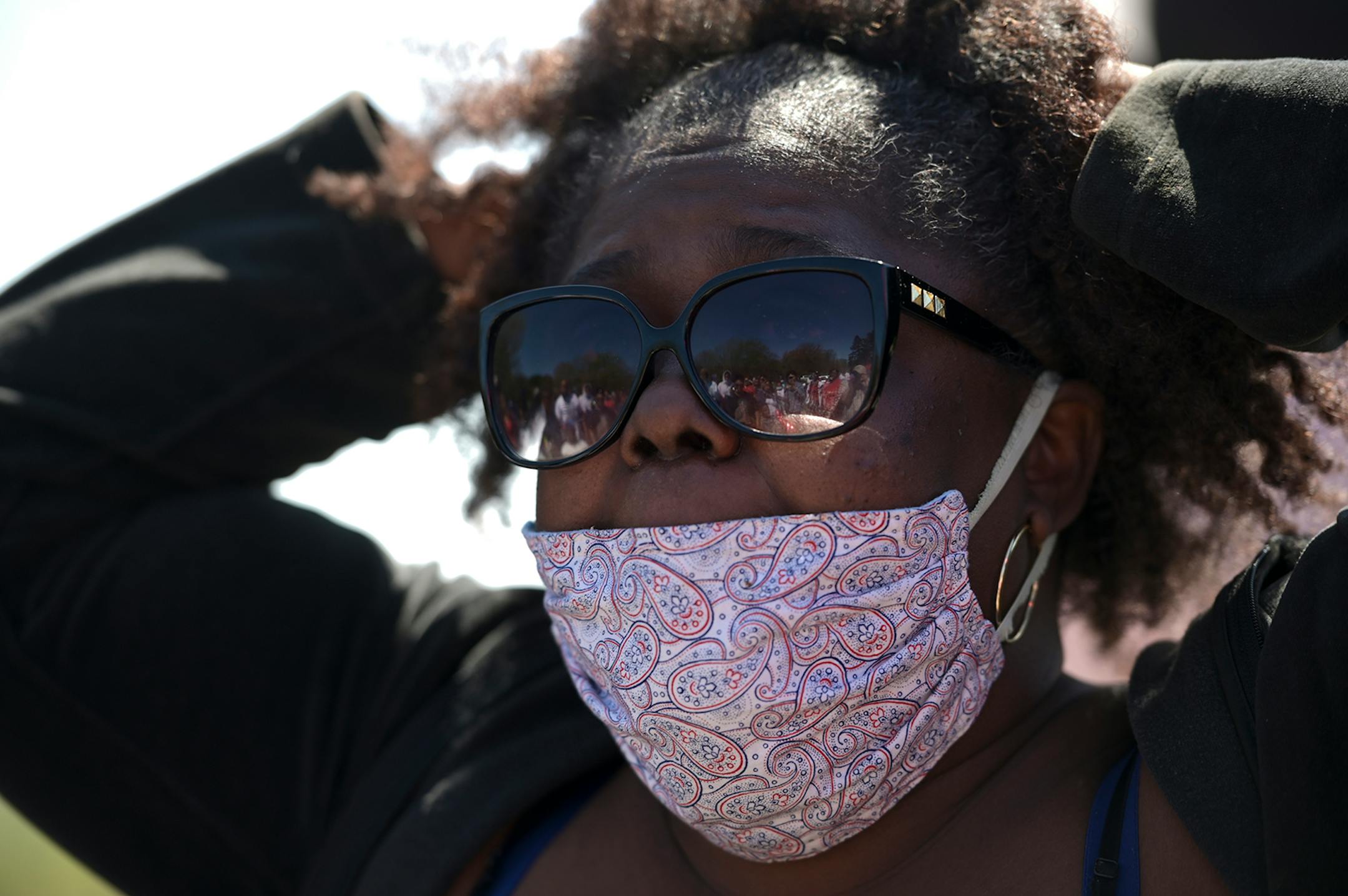 Valerie Lewis, sister of Doug Lewis, said a few words about her brother at a memorial gathering Sunday afternoon. A memorial was held for Lewis, who was shot and killed Friday night, on Sunday, May 3, 2020 at the Burns Avenue Scenic Overlook in St. Paul, Minn.