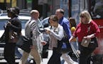 Honolulu in October will become the first U.S. city to impose fines if pedestrians text while walking crossing streets.