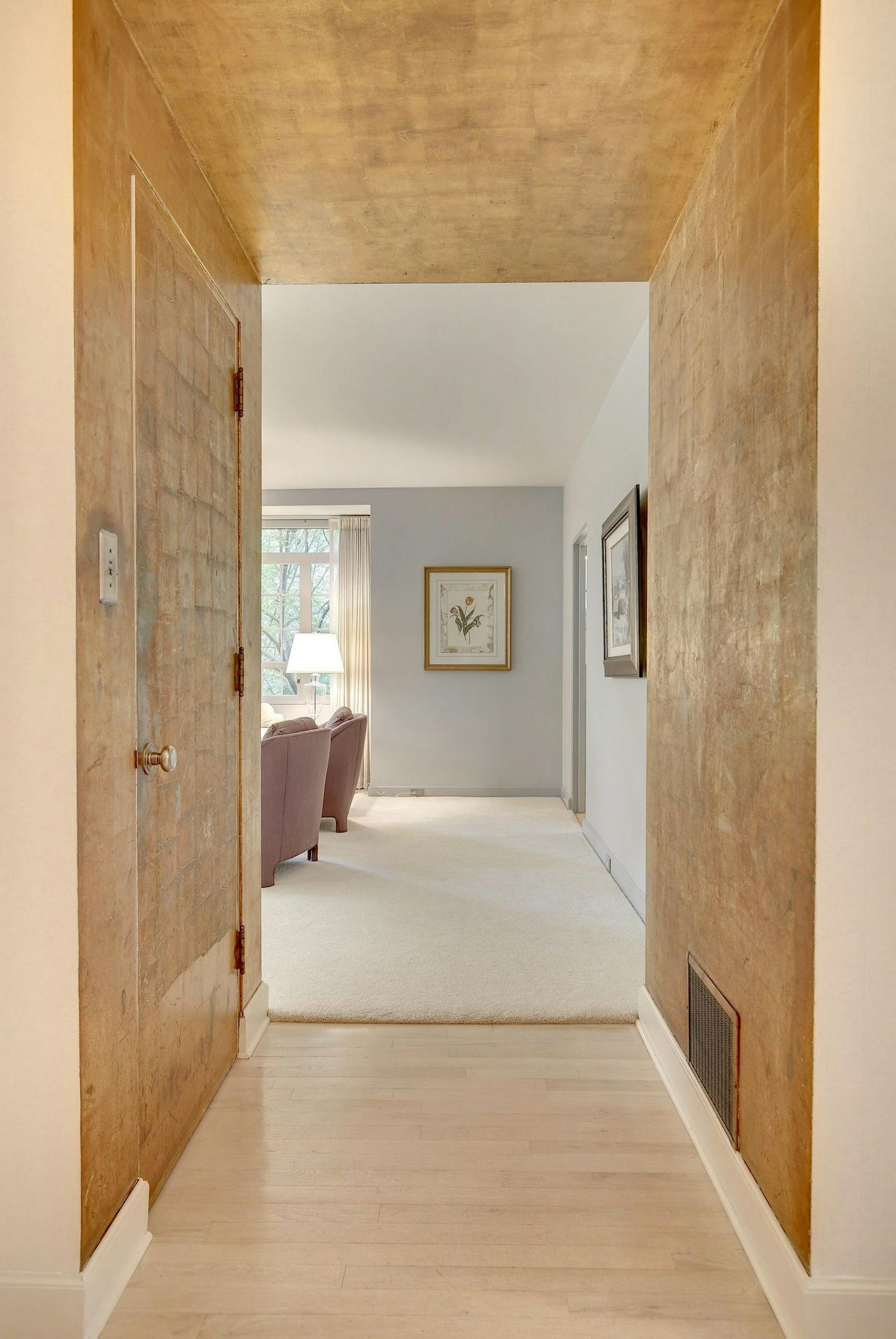 Gold leaf finish in the foyer hallway.