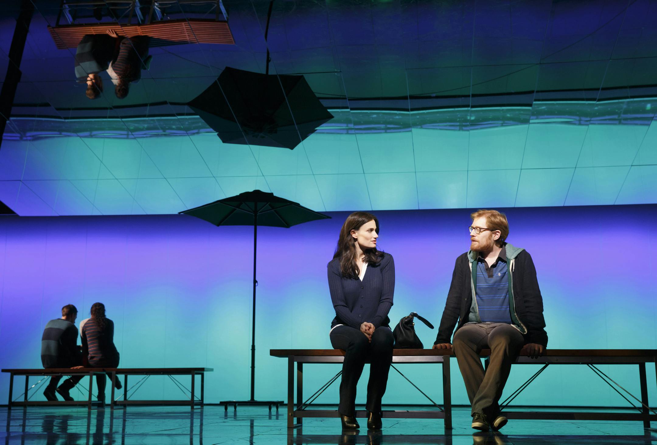 In an undated handout photo, Idena Menzel and Anthony Rapp rehearse a scene in "If/Then." Menzel, who had only infrequent success pursuing a career in pop music, accepted the lead in the new musical "If/Then" only to later realize the role, following two divergent paths in one woman's life, has eerie parallels with her own choices. (Joan Marcus via The New York Times) -- PHOTO MOVED IN ADVANCE AND NOT FOR USE - ONLINE OR IN PRINT - BEFORE FEB. 23, 2014. NO SALES; FOR EDITORIAL USE ONLY WITH STOR