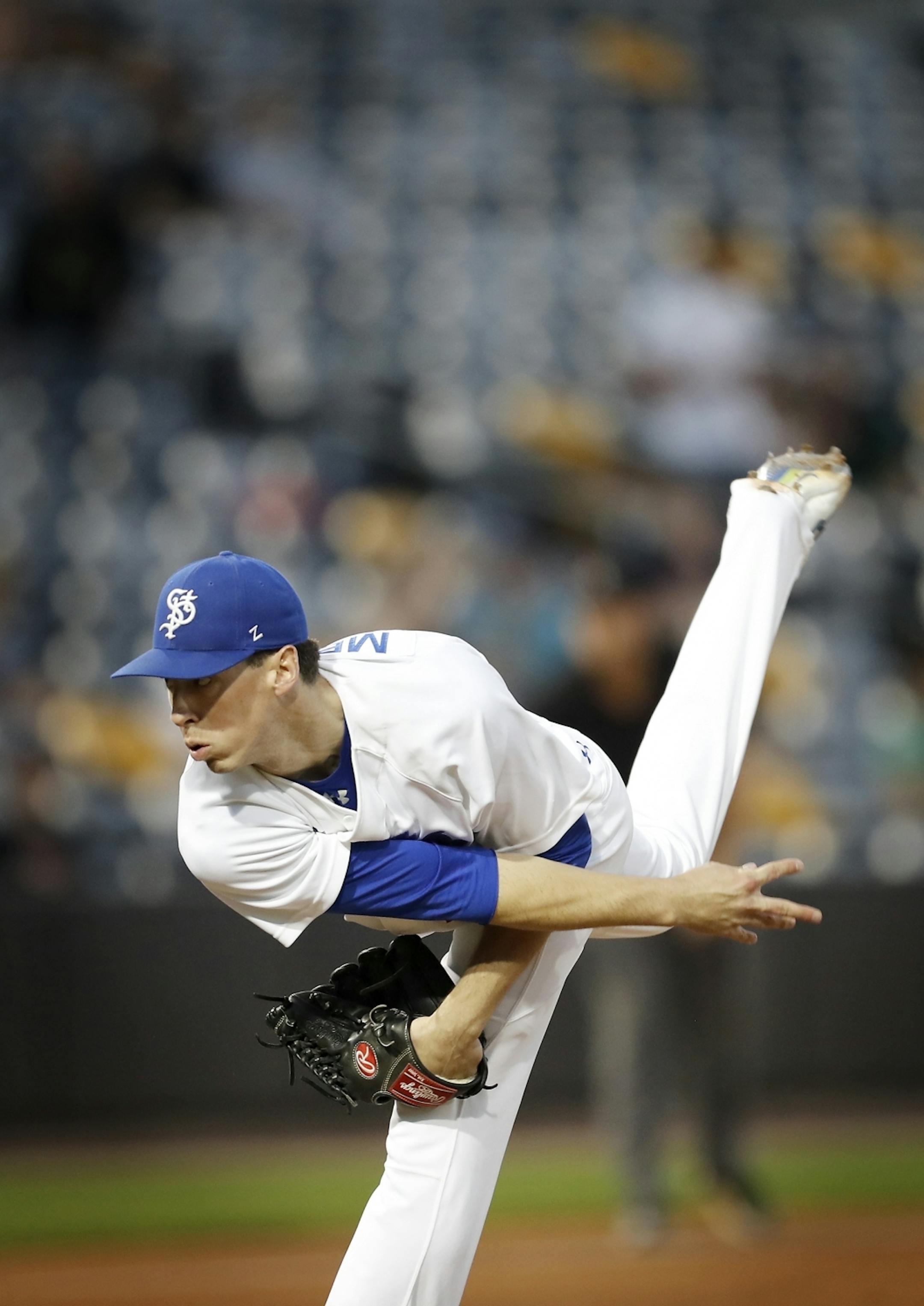 Saint Paul Saints pitcher Eddie Medina pitches.