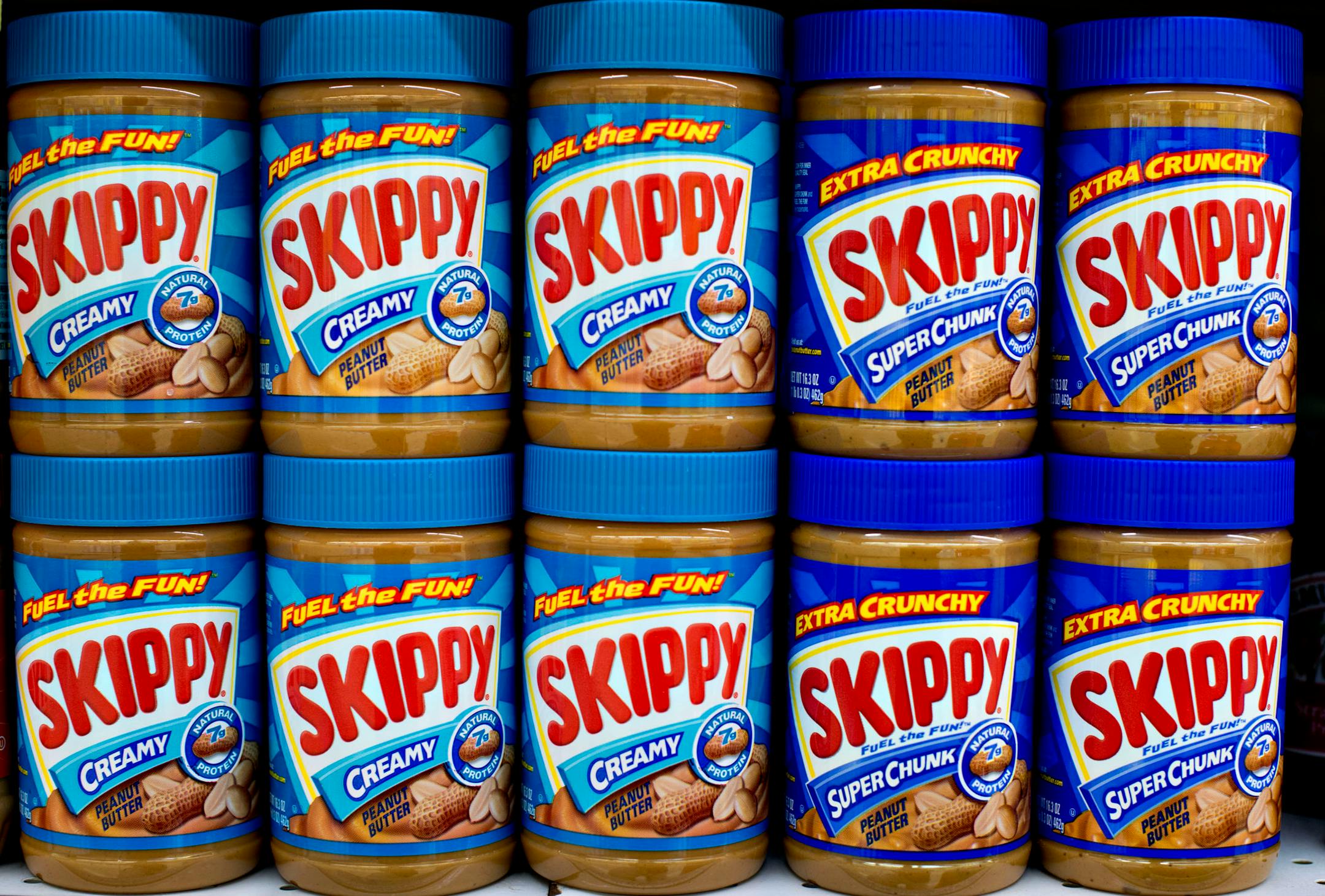 Unilever NV Skippy brand peanut-butter sits on display in a supermarket in Princeton, Illinois, U.S., on Thursday, Jan. 3, 2013. Hormel Foods Corp., the maker of Spam lunchmeat, agreed to buy the Skippy peanut-butter business from Unilever for about $700 million, expanding its presence beyond meats and further into China. Photographer: Daniel Acker/Bloomberg