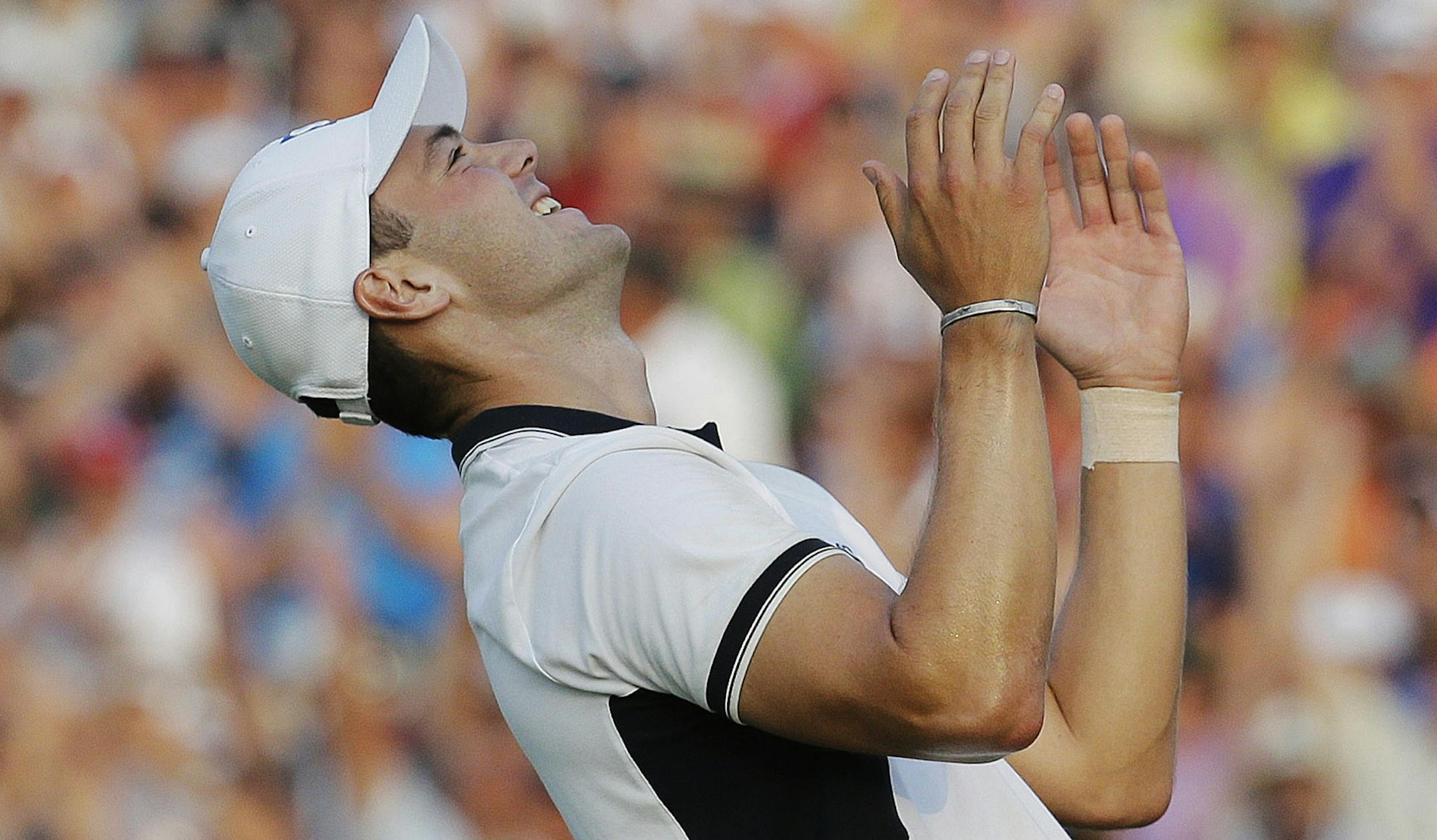 Martin Kaymer, of Germany celebrates after winning the U.S. Open golf tournament in Pinehurst, N.C., Sunday, June 15, 2014. (AP Photo/Eric Gay)