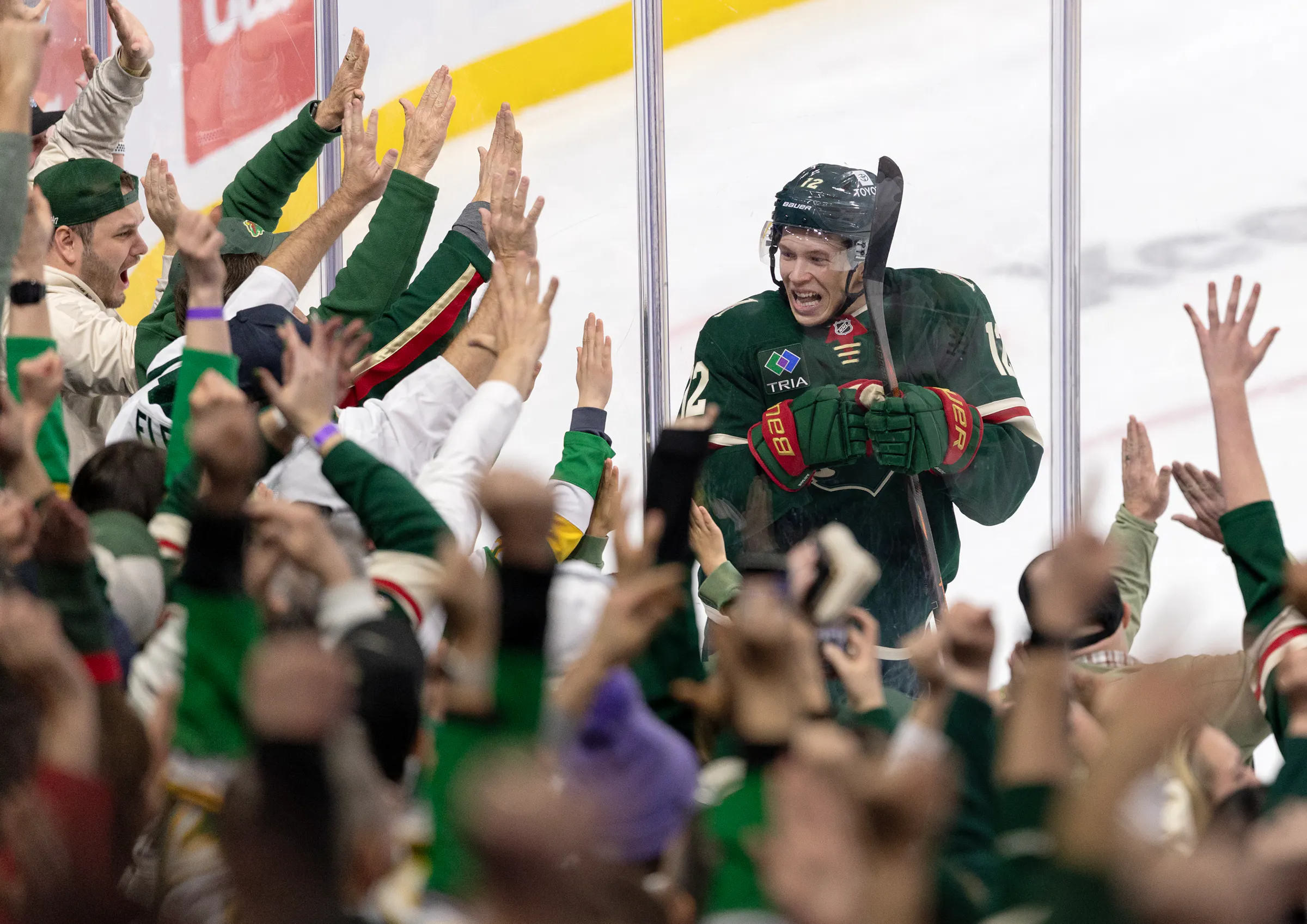 Wild rally past Ducks 3-2 in overtime, clinch playoff spot