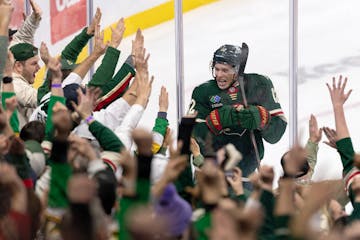 Matt Boldy of the Wild celebrates his game-winning overtime goal Tuesday night at Xcel Energy Center.