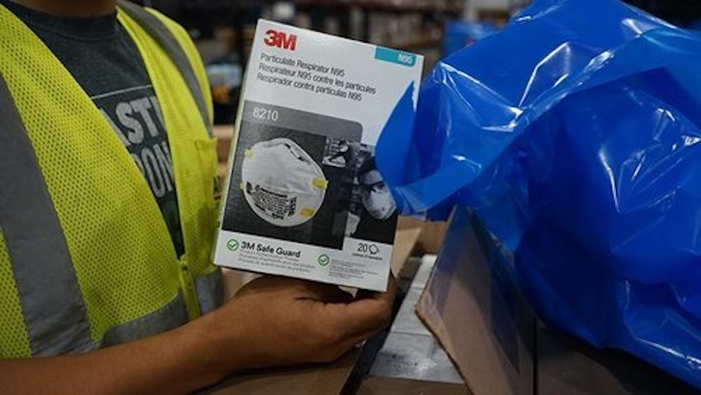 A worker packed N95 masks at a 3M plant.