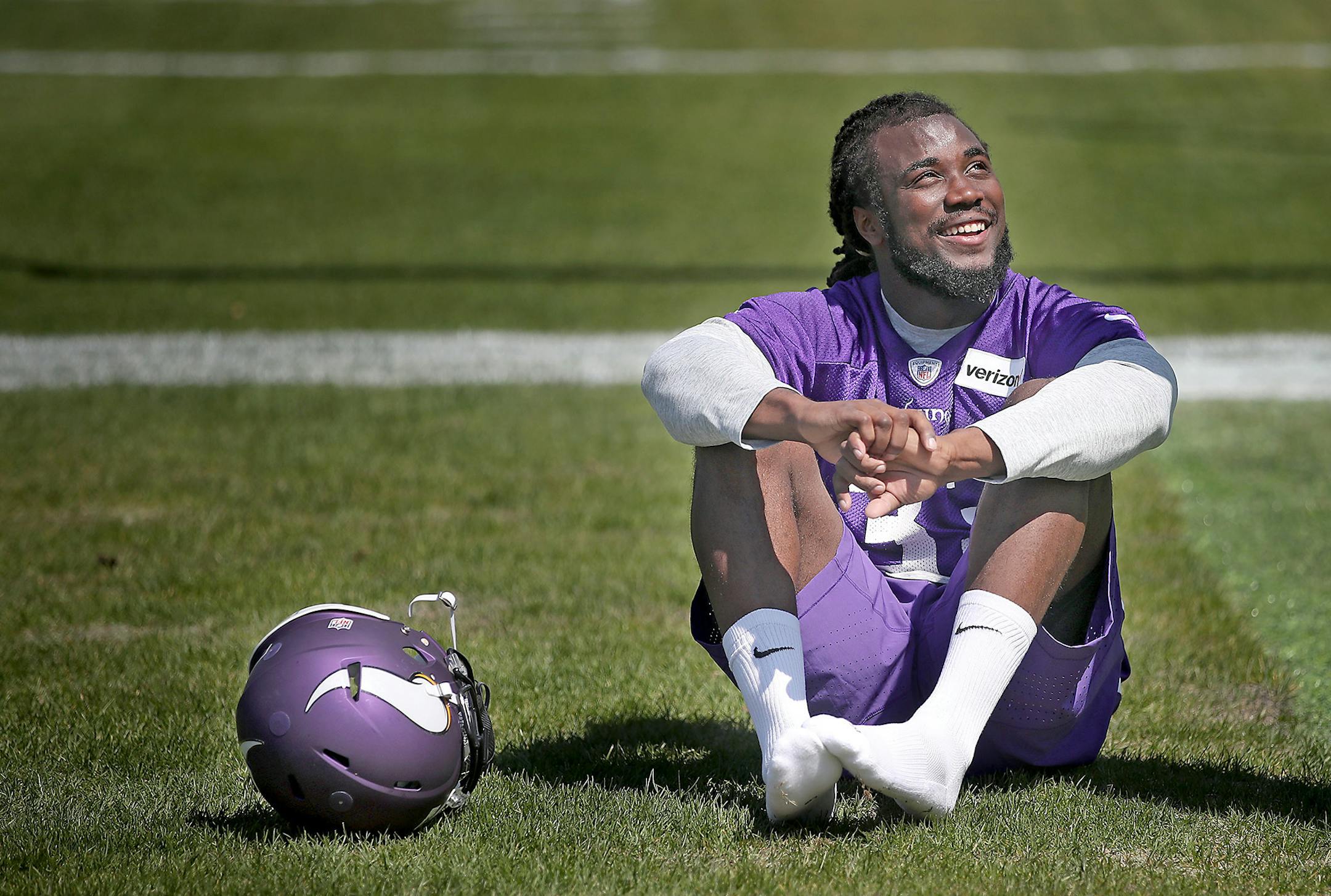 Former Florida State running back Dalvin Cook took in the sun as he waited for Vikings rookie minicamp at Winter Park
