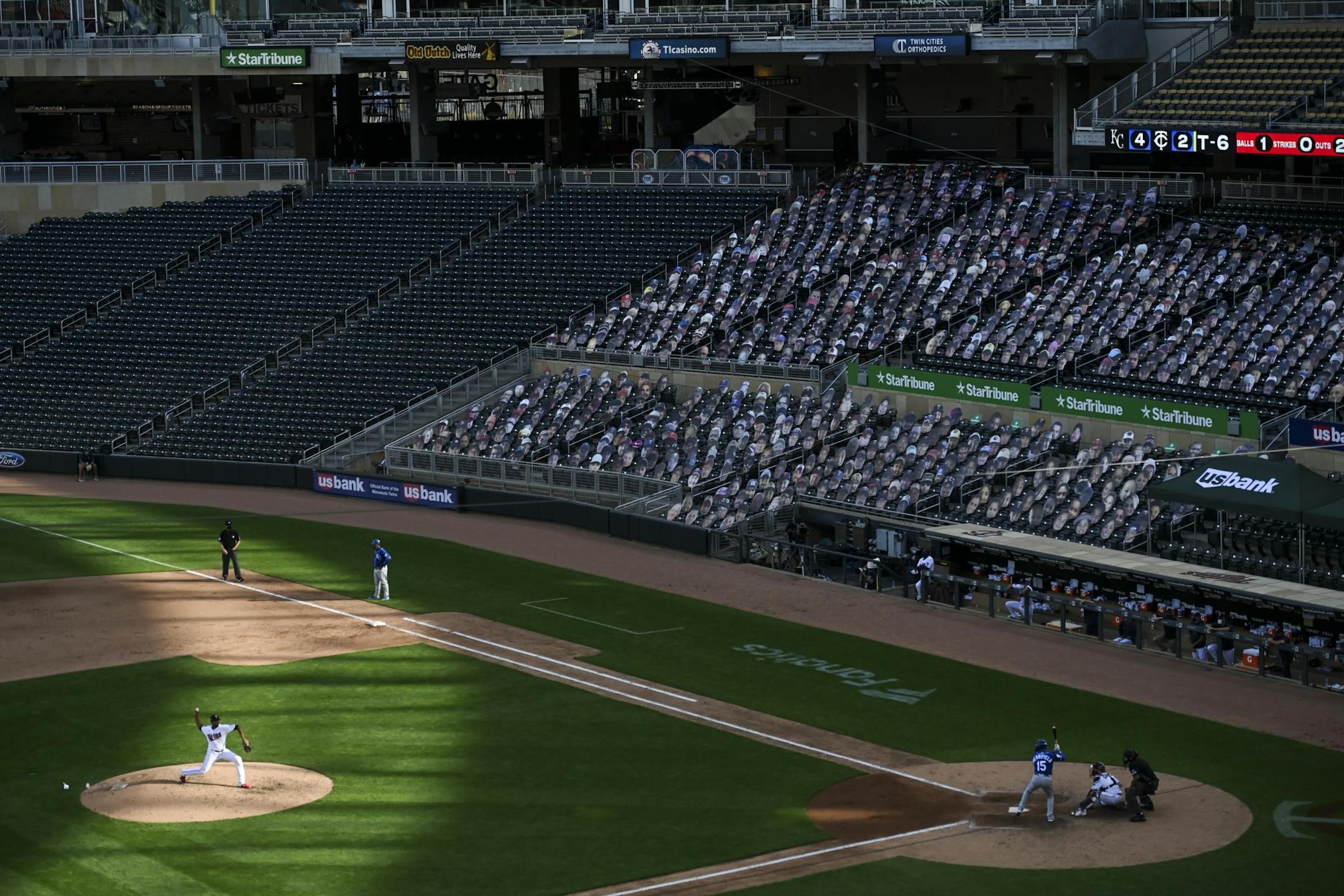 Minnesota Twins relief pitcher Jorge Alcala (66) threw a pitch against Kansas City Royals second baseman Whit Merrifield (15) in the top of the fifth inning.