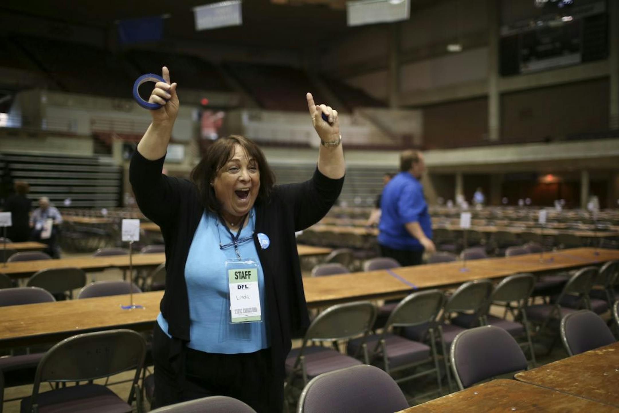 On the eve of their state convention, Minnesota Democrats began to converge in Rochester, Minn. Friday, June 1, 2012. While volunteers got the Mayo Civic Auditorium ready for the event Friday evening, Linda McEwen of St. Paul started dancing to Katy Perry's song "Firework" when it came over the sound system as it was being tested.