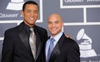 Ron Markham, left, and Irvin Mayfield arrive at the Grammy Awards on Sunday, Jan. 31, 2010, in Los Angeles. (AP Photo/Chris Pizzello)