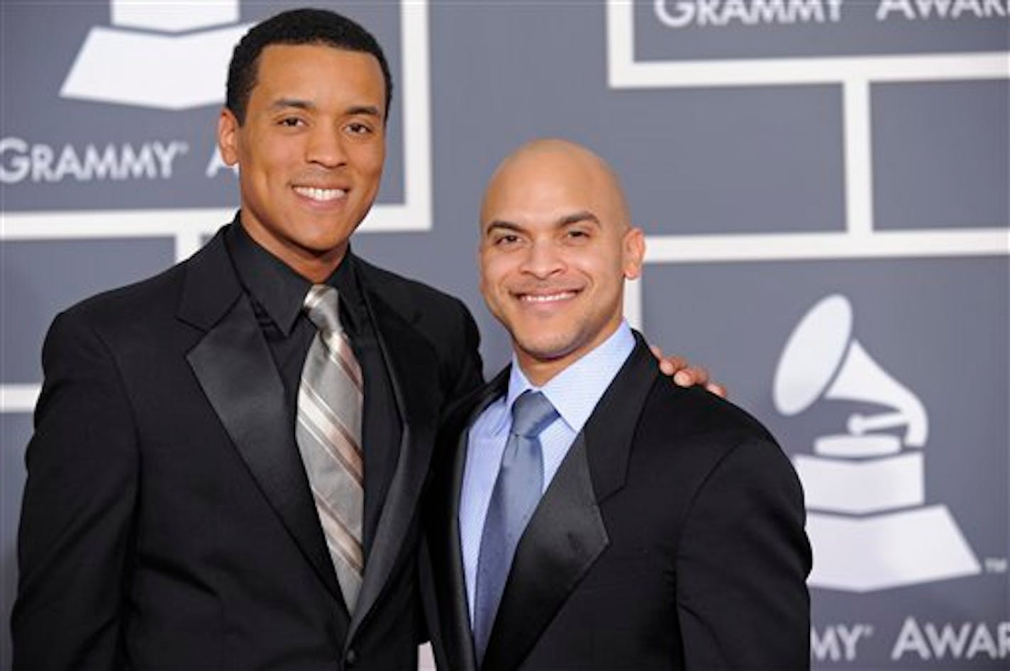 Ron Markham, left, and Irvin Mayfield arrive at the Grammy Awards on Sunday, Jan. 31, 2010, in Los Angeles. (AP Photo/Chris Pizzello)