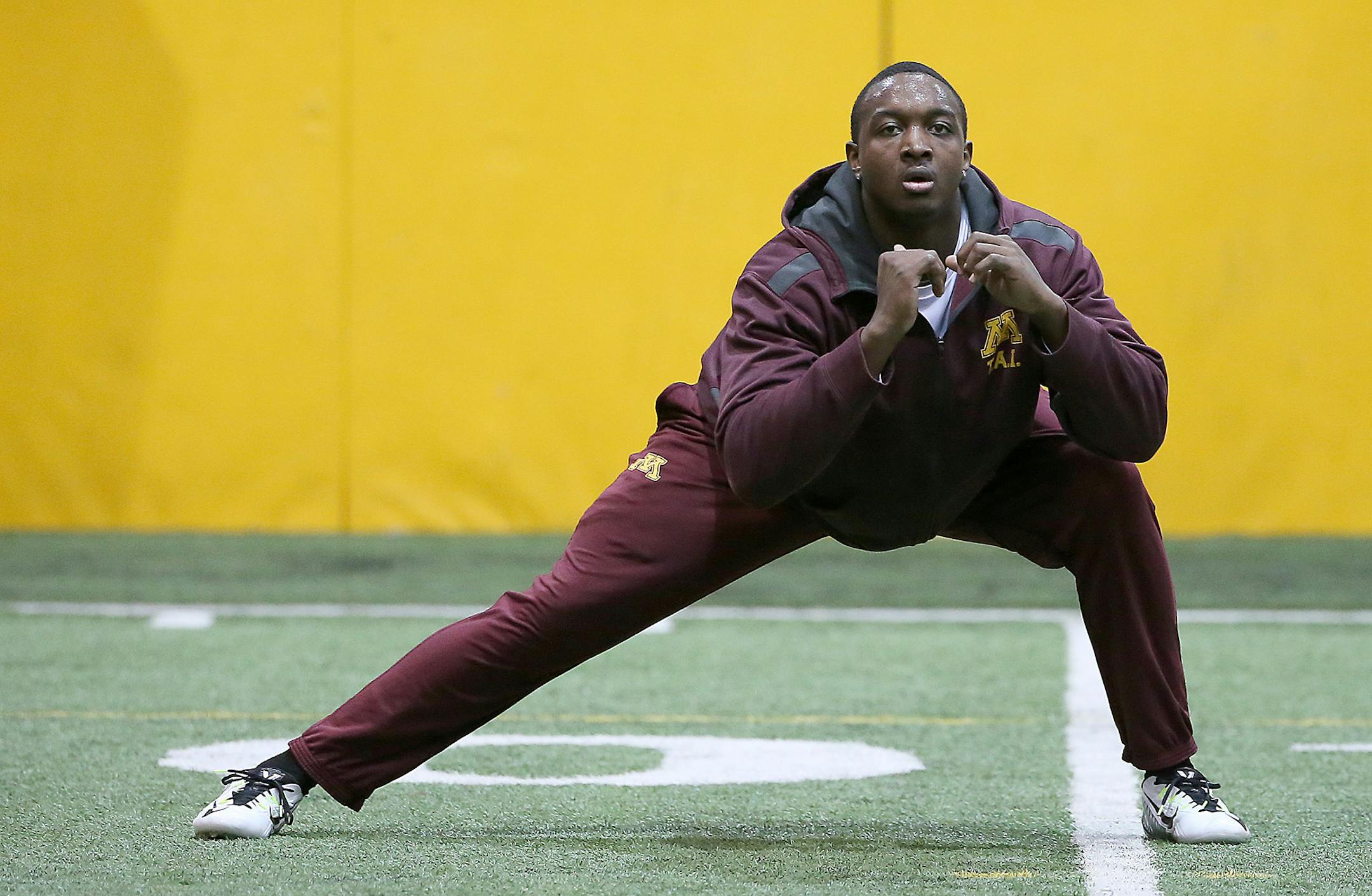 University of Minnesota's Ben Perry stretched before performing before NFL recruits during Pro Day at the Nagurski building on campus, Monday, March 2, 2015. Professional NFL scouts were on hand to take a look at former Gophers and local former college football players. ] (ELIZABETH FLORES/STAR TRIBUNE) ELIZABETH FLORES � eflores@startribune.com
