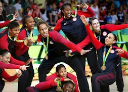 The USA�s Gold medal basketball team poses with their medals after the medal ceremony. The Lynx's Lindsay Whalen (top right) scored 17 points off th