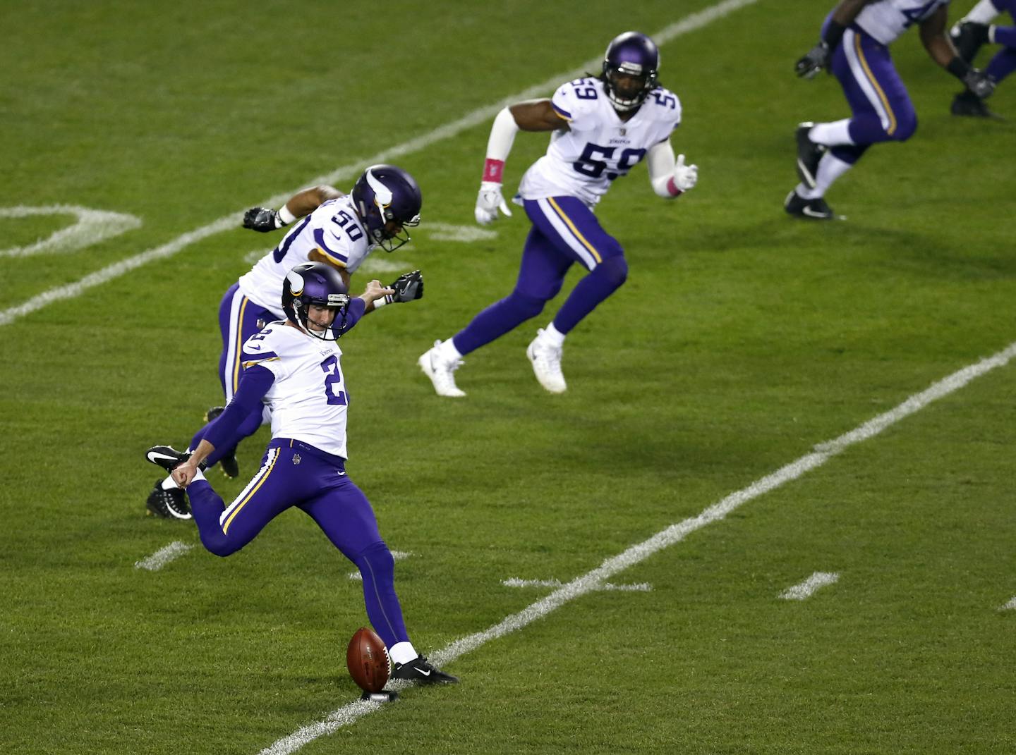 Minnesota Vikings' Kai Forbath (2) boots the opening kickoff to the Chicago Bears to start an NFL football game, Monday, Oct. 9, 2017, in Chicago. (AP Photo/Kiichiro Sato) ORG XMIT: CXB1