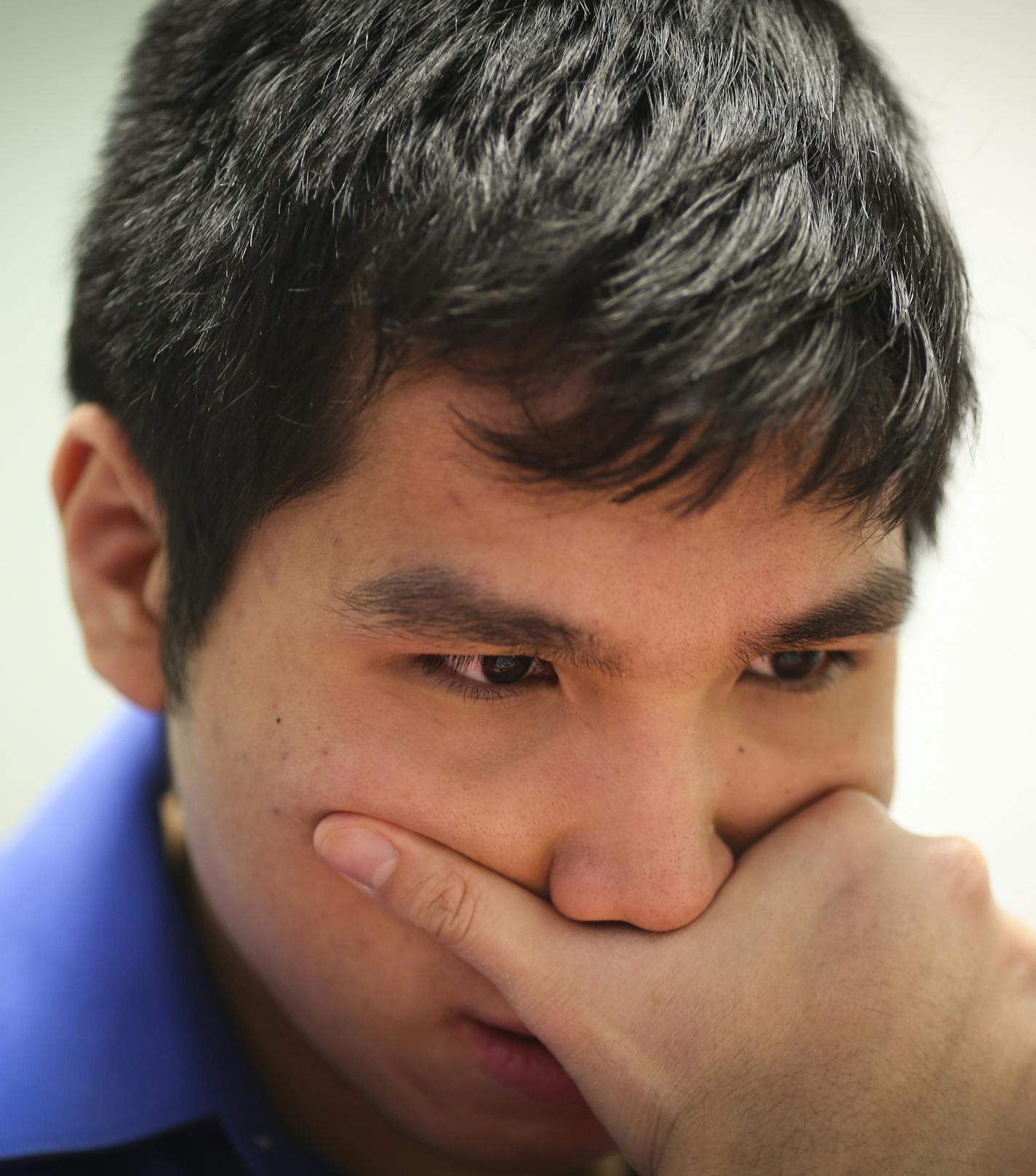 Chess Grandmaster Wesley So concentrated as he played chess with Sean Nagle at the Ridgedale Public Library on Friday, February 27, 2015 in Minnetonka, Minn. ] RENEE JONES SCHNEIDER &#x2022; reneejones@startribune.com