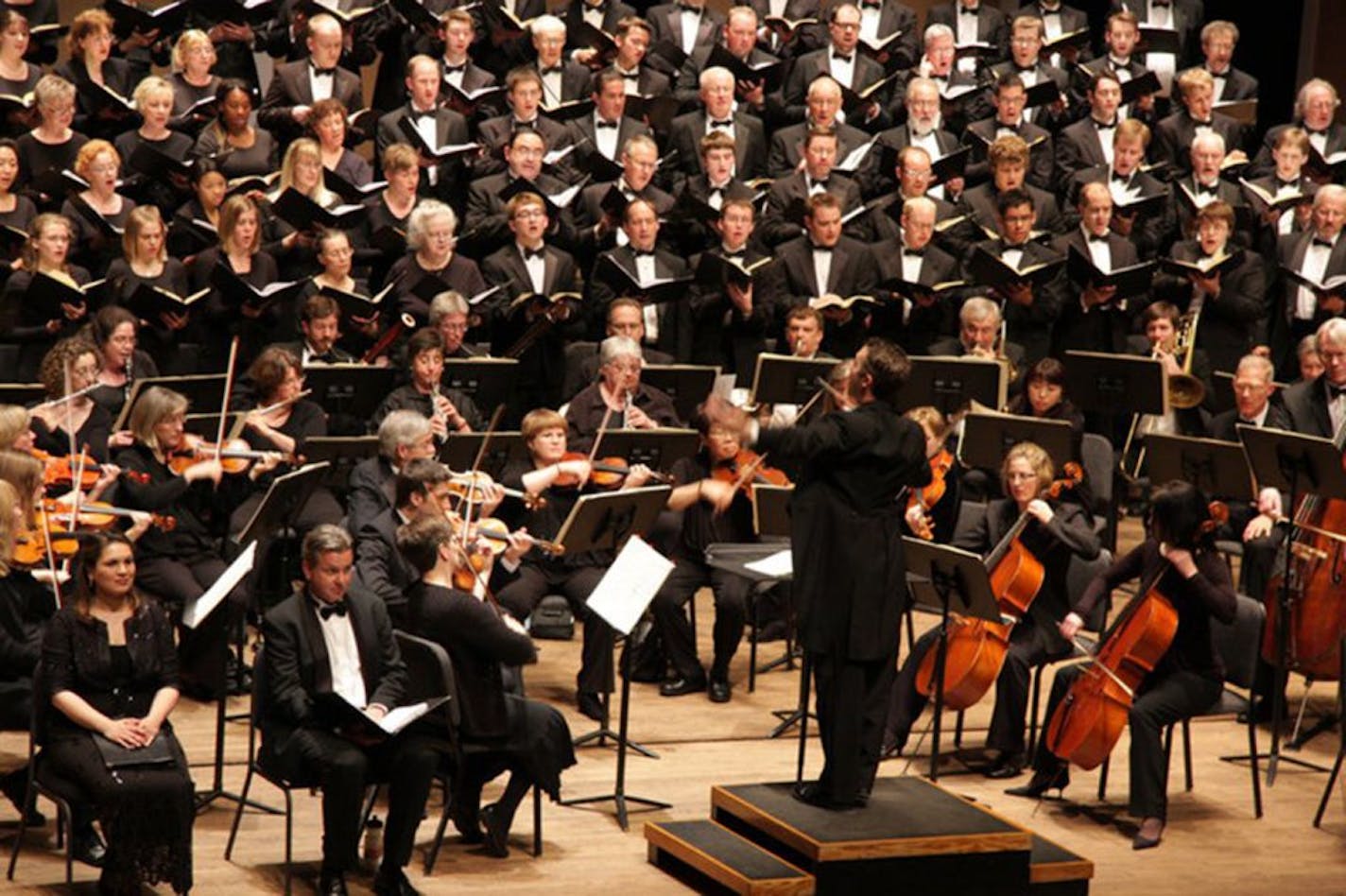 Matthew Mehaffey conducts the Oratorio Society of Minnesota, one of many groups presenting classical concerts in the Twin Cities as the two major orchestras remain on lockout. Credit: Kerry Gustafson