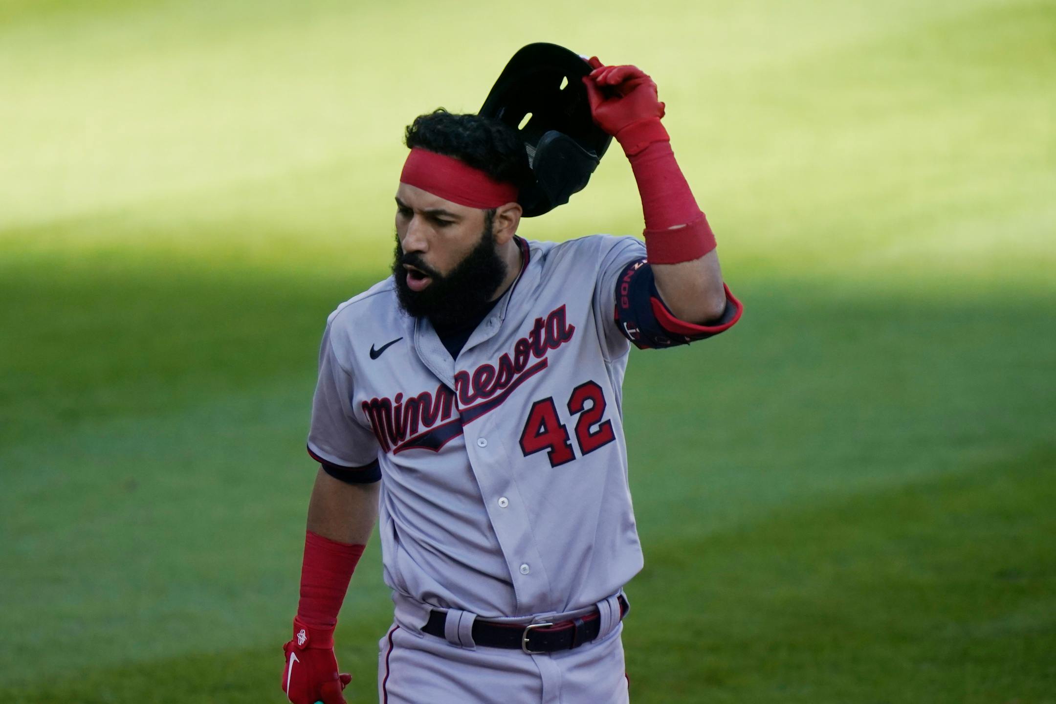 Minnesota Twins' Marwin Gonzalez reacts after striking out to end the game during the seventh inning of the second baseball game of a doubleheader against the Detroit Tigers, Saturday, Aug. 29, 2020, in Detroit. (AP Photo/Carlos Osorio)
