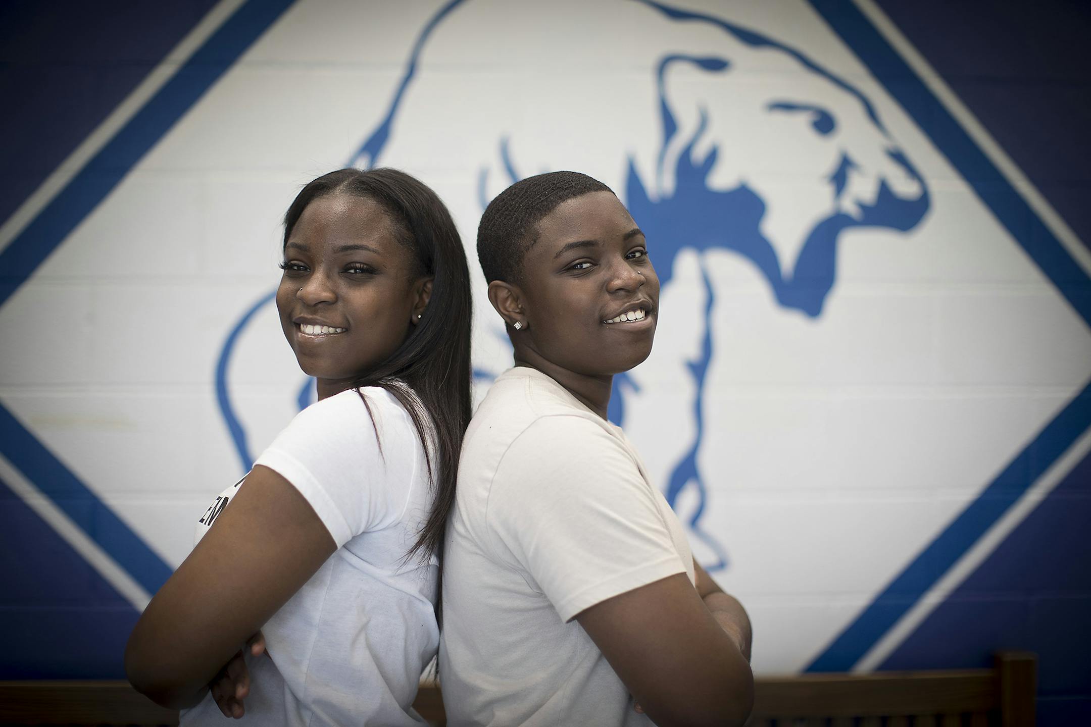 Identical twins Allie, left, and Alexx Hopkins are valedictorian and salutatorian of their North High School senior class. Allie Hopkins will go to the University of Minnesota and Alexx will go to St. Cloud. Here, they both posed for a photo at the school, Thursday, April 27, 2017 in Minneapolis, MN. ] ELIZABETH FLORES &#xef; liz.flores@startribune.com