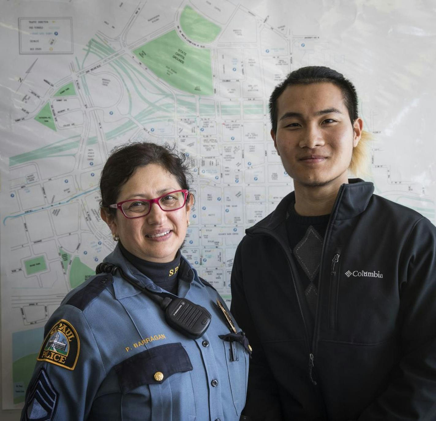 Sgt. Pamela Barragan, left, with the St. Paul Police Department's Community Engagement unit will head the first Law Enforcement Career Path Academy and Ehdoh Ezekisoe, 22, is interested in applying for the program.