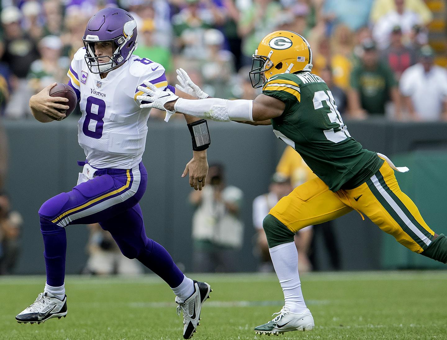 Vikings quarterback Kirk Cousins scrambled out of the pocket in the fourth quarter. ] CARLOS GONZALEZ &#xef; cgonzalez@startribune.com &#xf1; September 16, 2018, Green Bay, WI, Lambeau Field, NFL, Minnesota Vikings vs. Green bay Packers