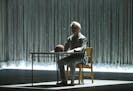 David Byrne began his show seated for "Here" off his first solo album in 14 years, American Utopia.