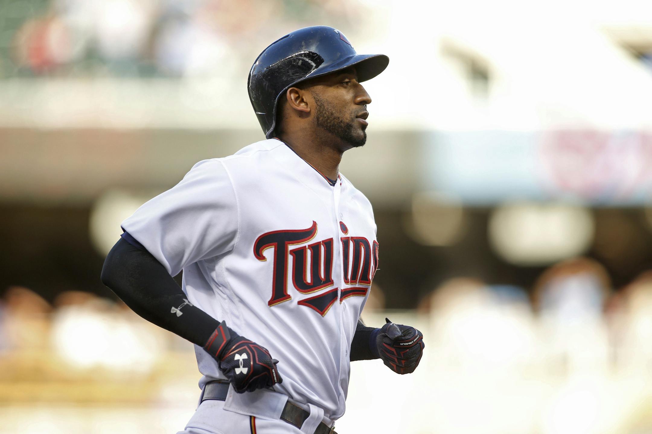 Minnesota Twins' Eduardo Nunez trots around the bases after he hit a home run against the Miami Marlins in the first inning of a baseball game Tuesday, June 7, 2016, in Minneapolis. (AP Photo/Bruce Kluckhohn)