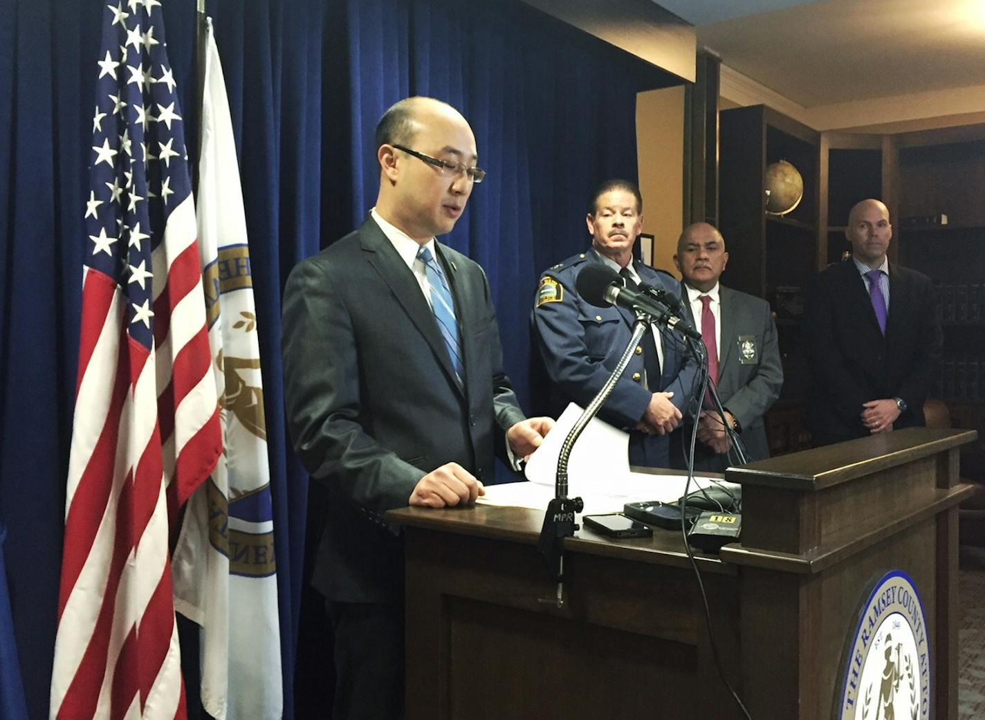 Ramsey County Attorney John Choi, speaking at a news conference this morning, filed criminal and civil charges against the archdiocese last summer for its failed oversight of a former priest.