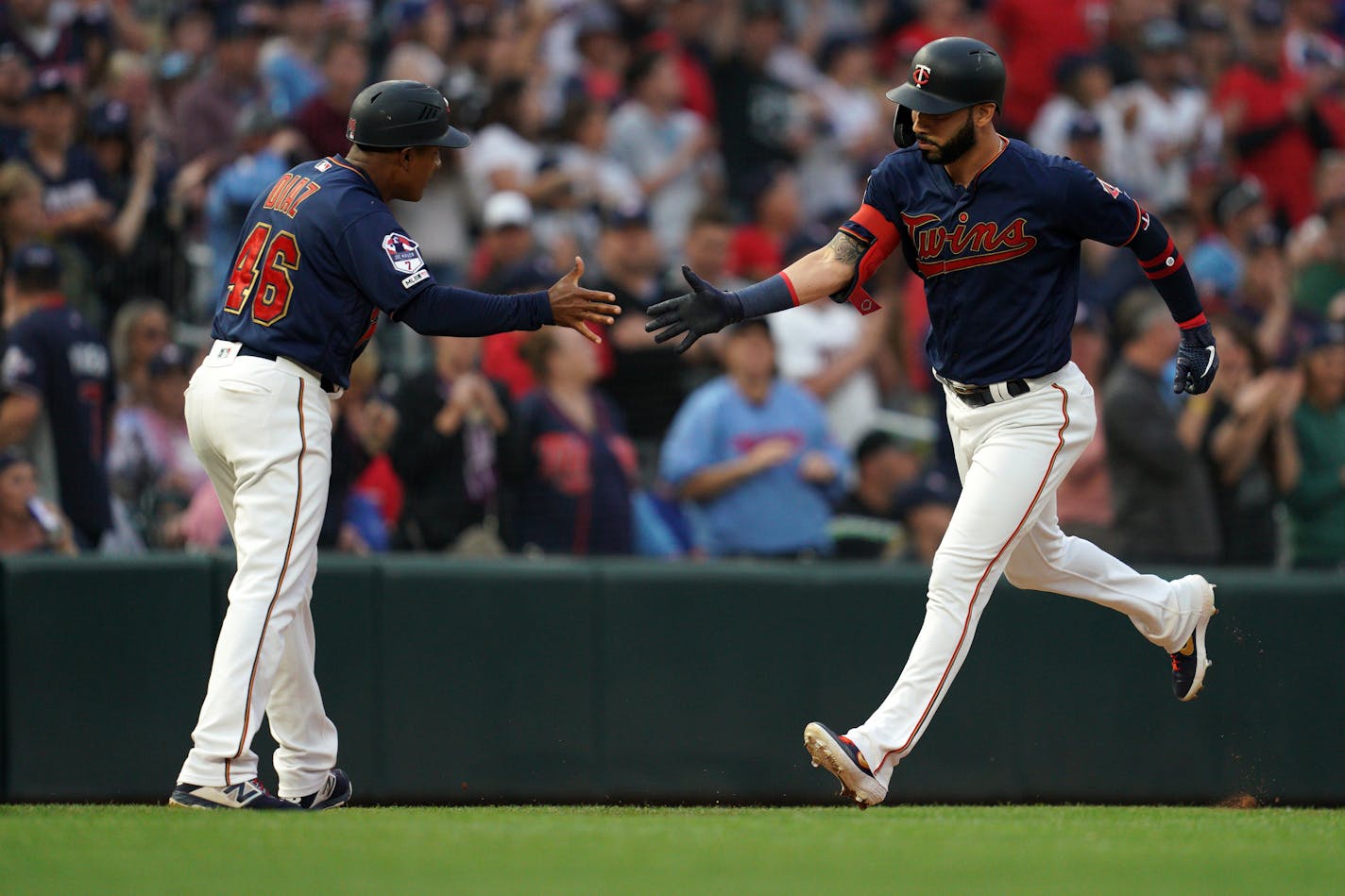 Minnesota Twins third baseman Marwin Gonzalez (9) celebrated with Minnesota Twins third base coach Tony Diaz (46) as he rounded the bases after hitting a two-run home run in the fifth inning. ] ANTHONY SOUFFLE • anthony.souffle@startribune.com The Minnesota Twins played the Kansas City Royals in an MLB game Saturday, June 15, 2019 at Target Field in Minneapolis.