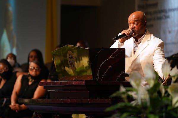 Rev. Jerry McAfee preached during a community memorial for George Floyd Friday at the Shiloh Temple International Ministries in north Minneapolis. ] A