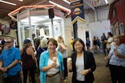Sen. Amy Klobuchar and U.S. Trade Representative Katherine Tai ate ice cream in the Dairy Buiding at the State Fair Wednesday.