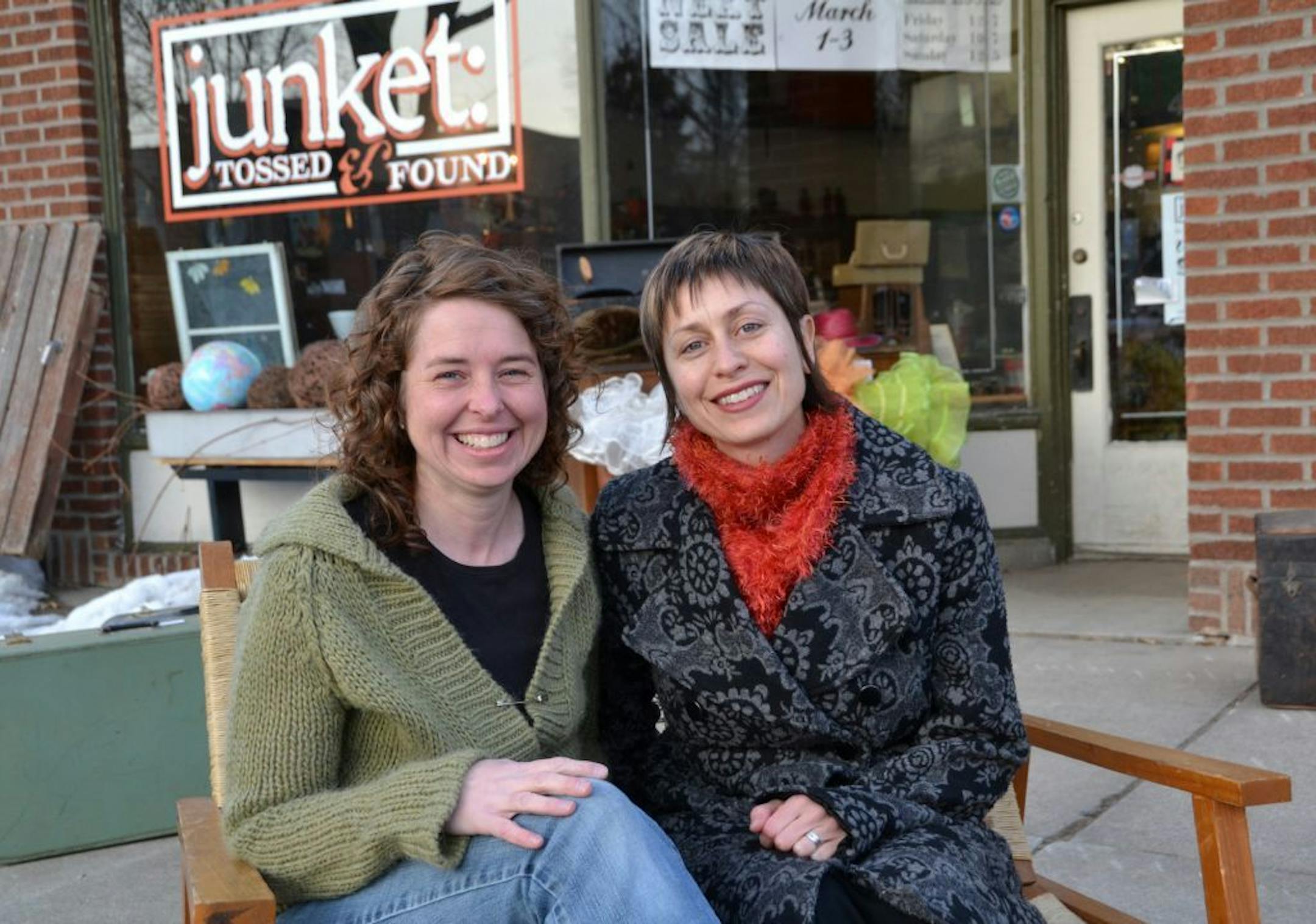 (Left to right) Store owner Julie Kearns and organizer Beth DeZiel sit for a photo outside of Kearns' store, junket: Tossed & Found.