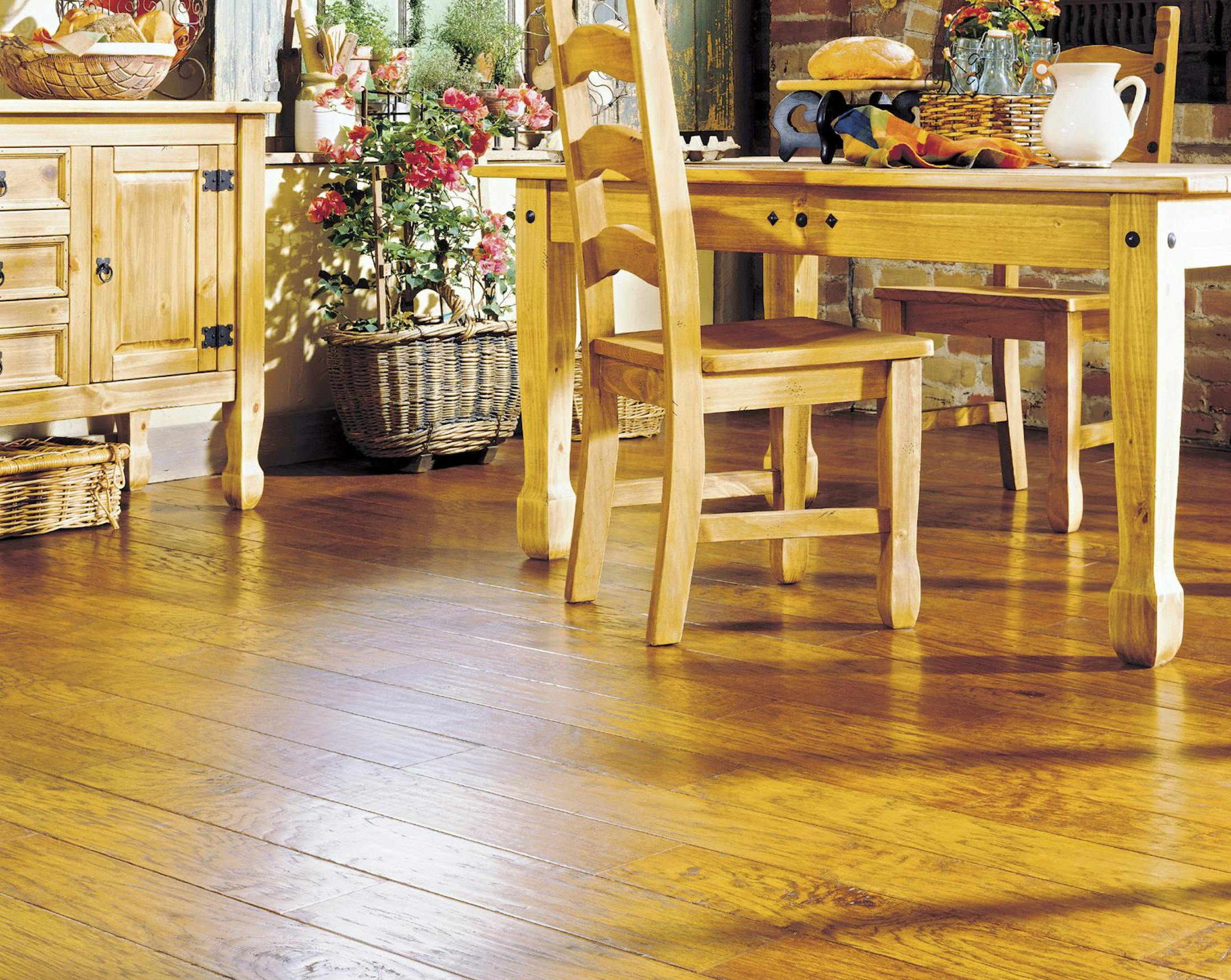 The latest hardwood styles are distressed, beveled, scratched with wormholes, and have a hand-hewn appearance, like this Biscotti style hardwood floor. (Courtesy Anderson Hardwood/Orange County Register/KRT) ORG XMIT: 1027094