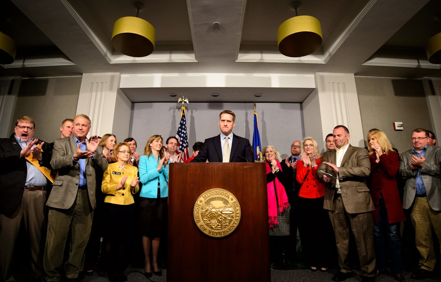 House GOP Leader Kurt Daudt received applause from Republican House members when he said "I'm proud to say tht Democrats' total control of state government in Minnesota has come to an end." Hewas joined by several new and returning Republican House members to celebrate the Republican majority returning to the House. ] GLEN STUBBE * gstubbe@startribune.com Wednesday, November 5, 2014 EDS, he is actually saying this line here.