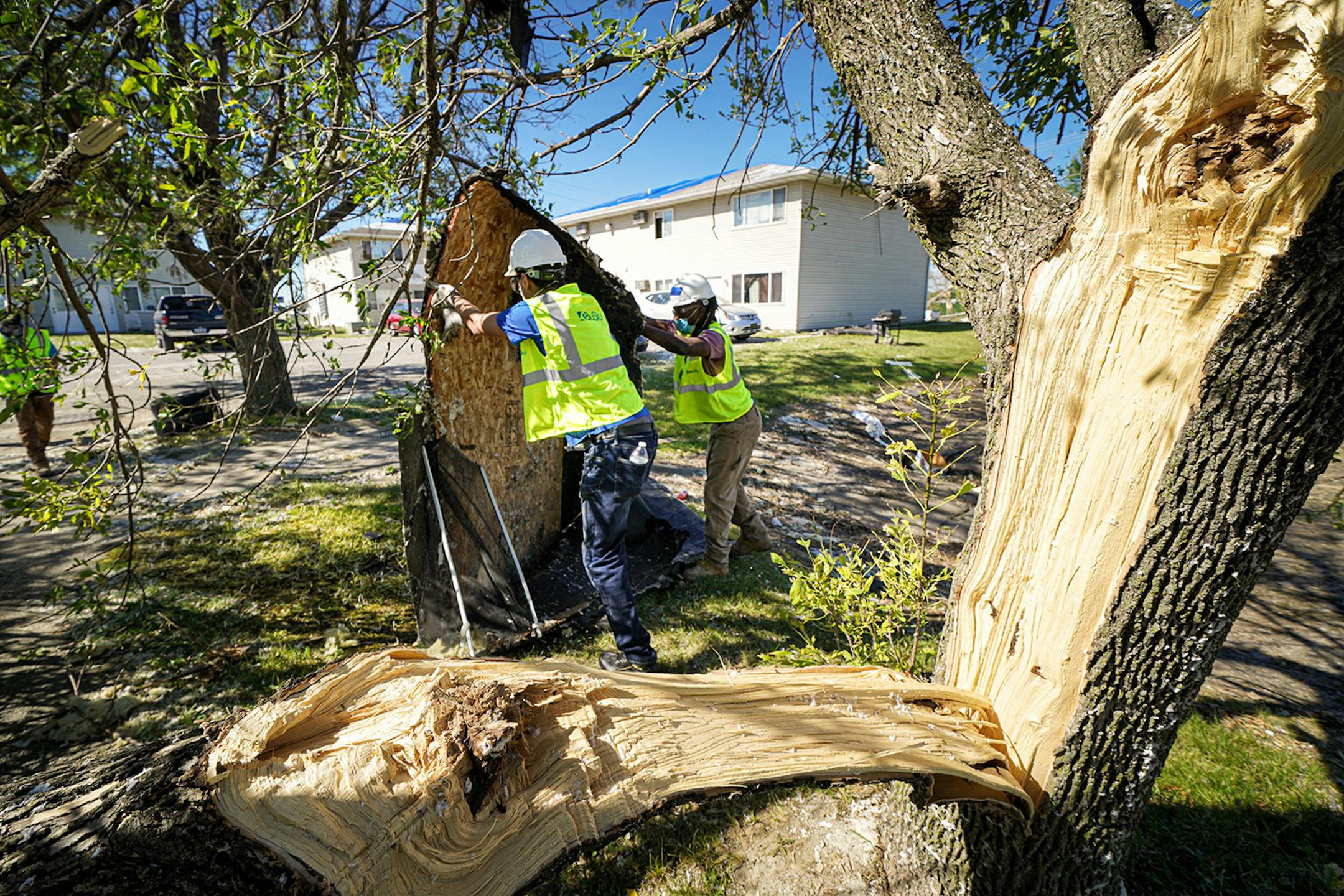 Neighbors, volunteers and contract workers from Blue Sky Restoration cleaned up debris from Monday's derecho that ripped through Cedar Rapids. Derecho storm devastation in Cedar Rapids Iowa, with 130,000 residents the state's second-largest city. The "inland hurricane" last week wiped out half the city's tree canopy and a week later, thousands are still homeless and without power.