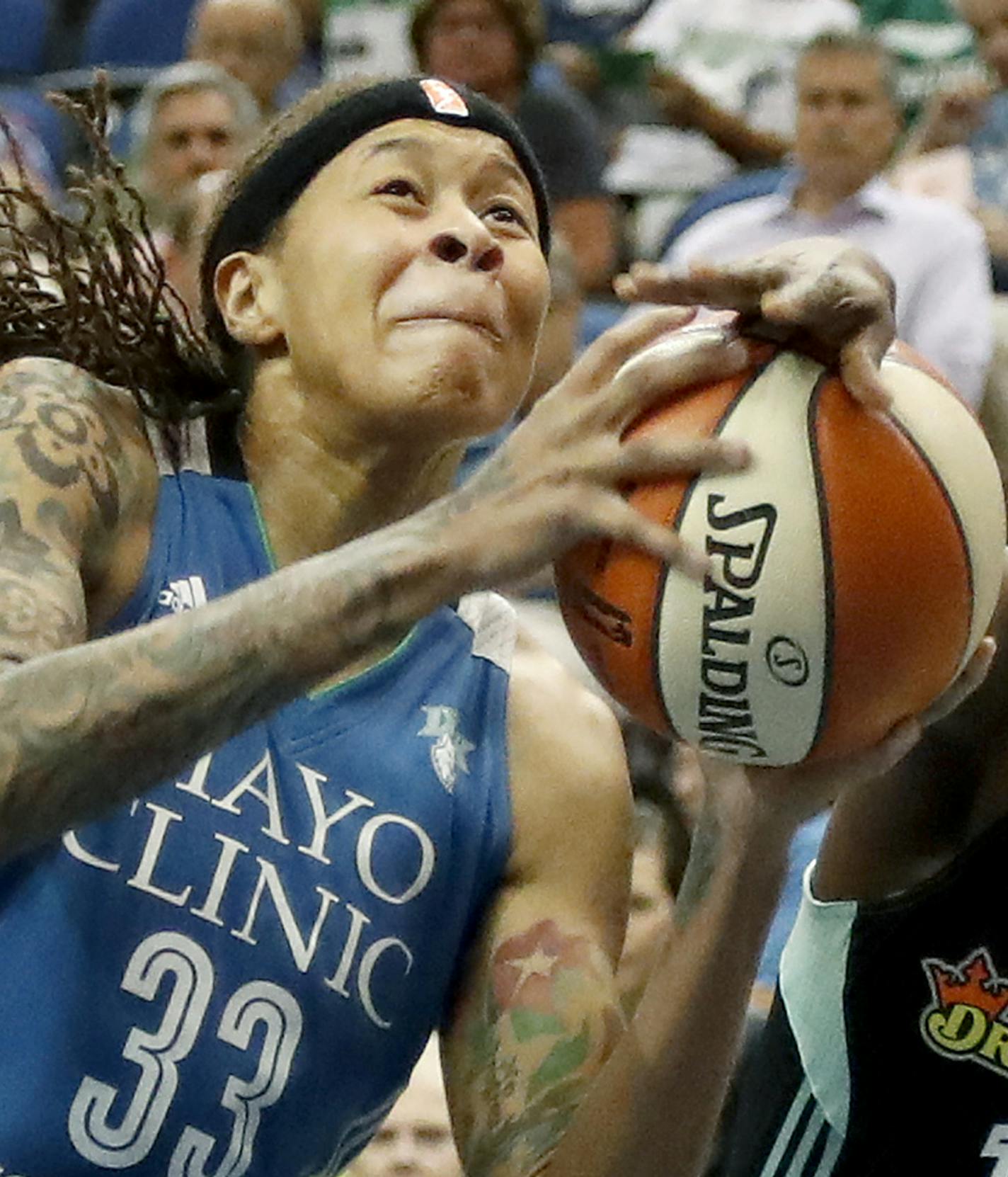 Seimone Augustus (33) was defended by Sugar Rodgers (14) in the first quarter. ] CARLOS GONZALEZ cgonzalez@startribune.com - June 29, 2016, Minneapolis, MN, Target Center, WNBA, Basketball, Minnesota Lynx vs. New York Liberty